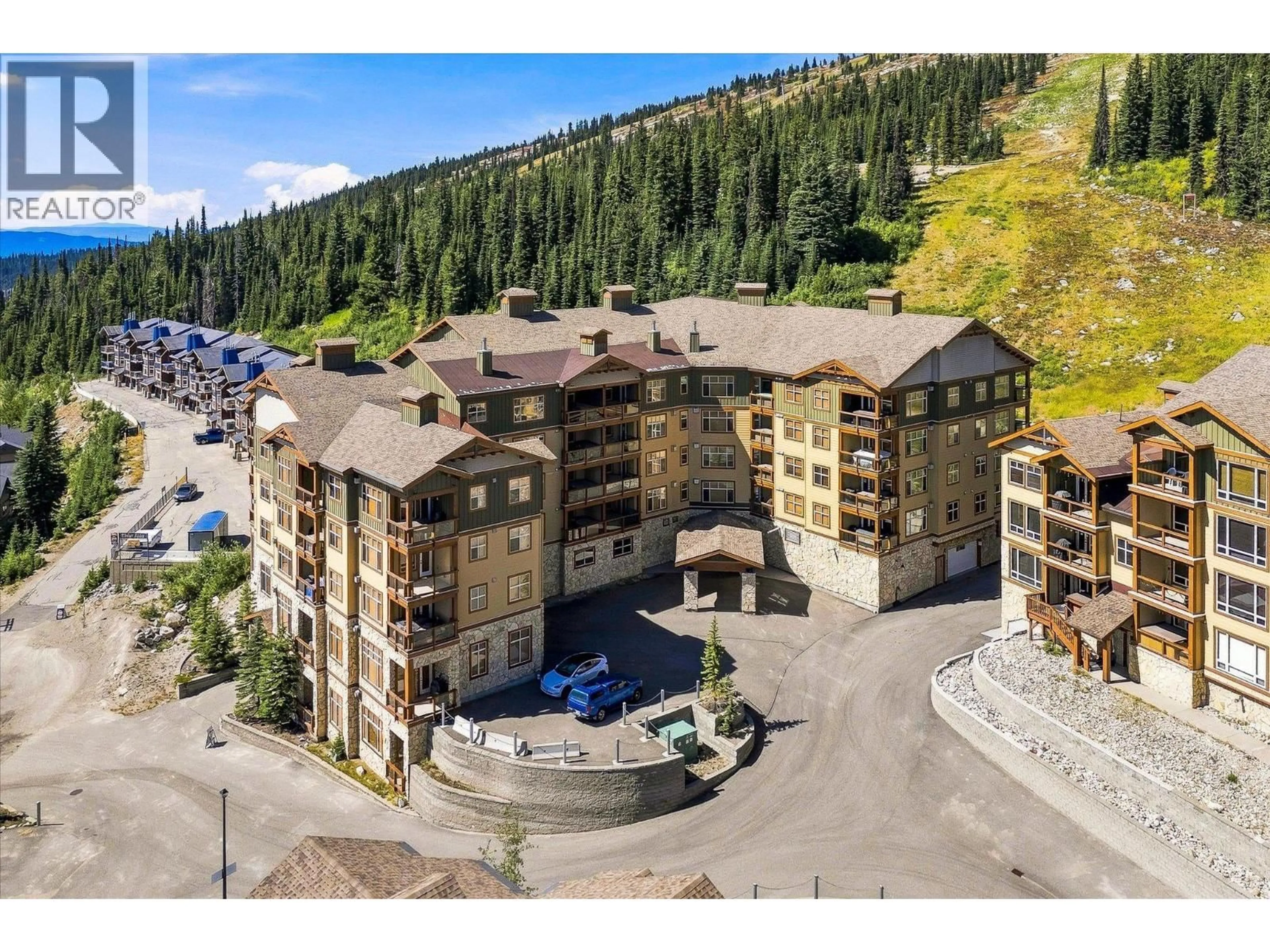 A pic from outside/outdoor area/front of a property/back of a property/a pic from drone, unknown for 4 - 304 - 7700 PORCUPINE ROAD, Big White British Columbia V1P1T4