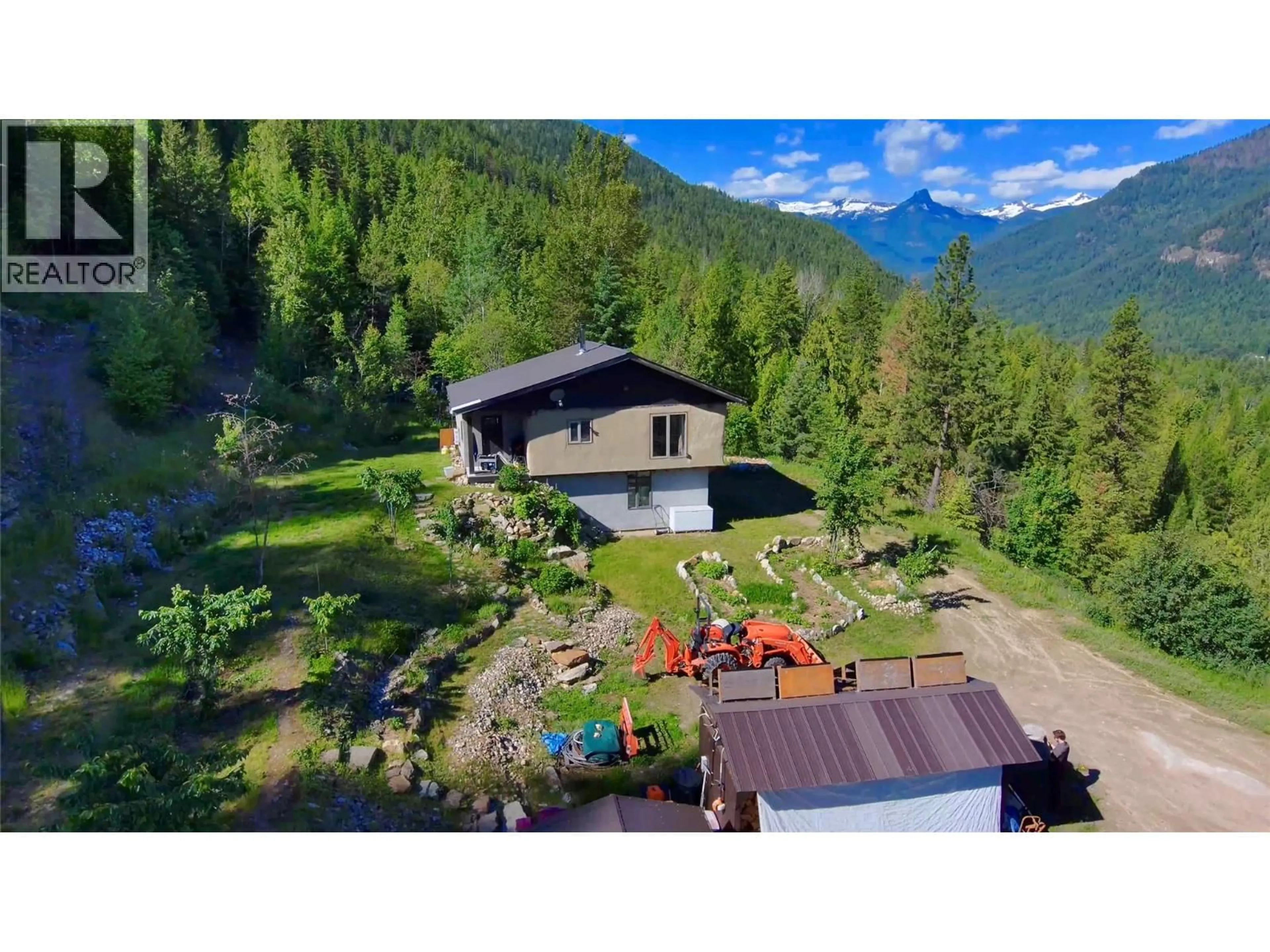 A pic from outside/outdoor area/front of a property/back of a property/a pic from drone, mountain view for 4650 6 HIGHWAY, Winlaw British Columbia V0G2J0