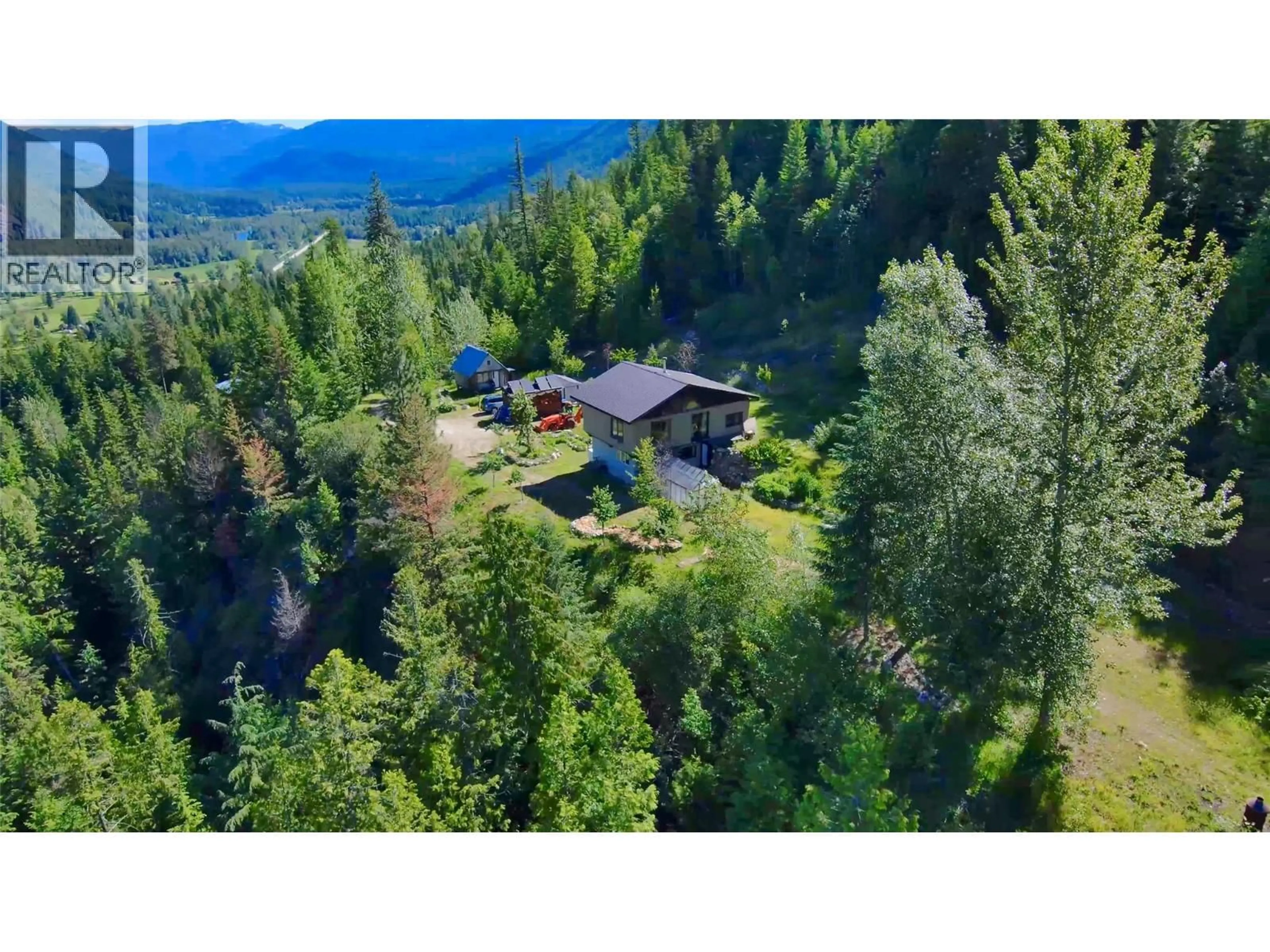 A pic from outside/outdoor area/front of a property/back of a property/a pic from drone, mountain view for 4650 6 HIGHWAY, Winlaw British Columbia V0G2J0