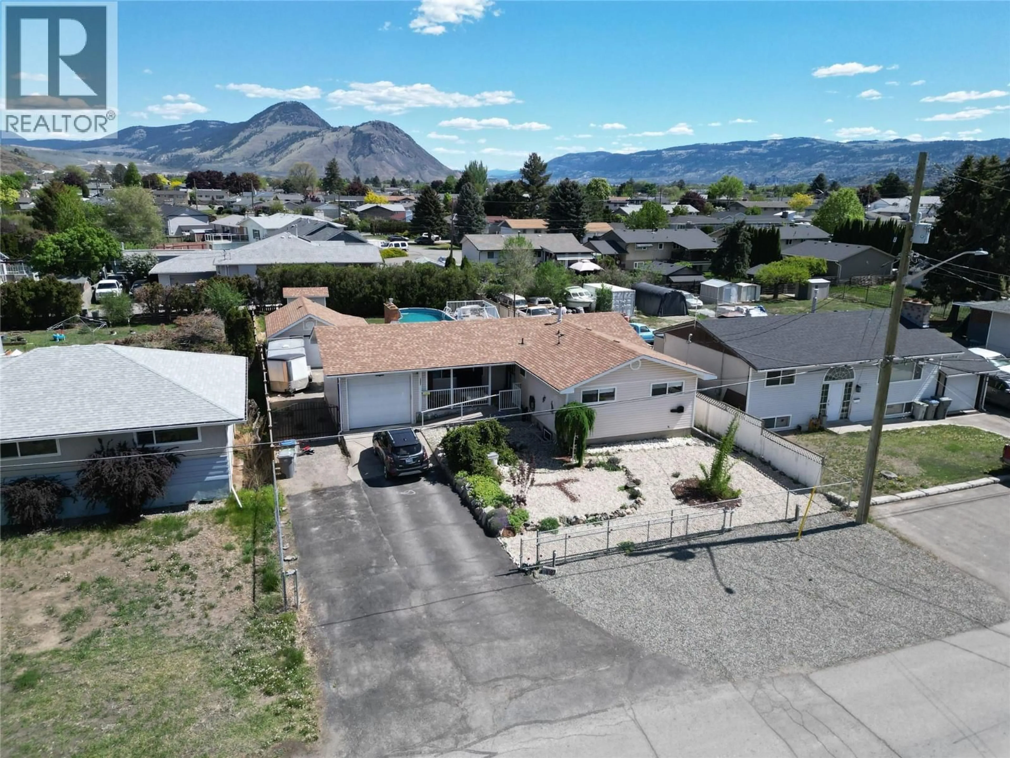A pic from outside/outdoor area/front of a property/back of a property/a pic from drone, mountain view for 1087 LAROQUE STREET, Kamloops British Columbia V2B5L6