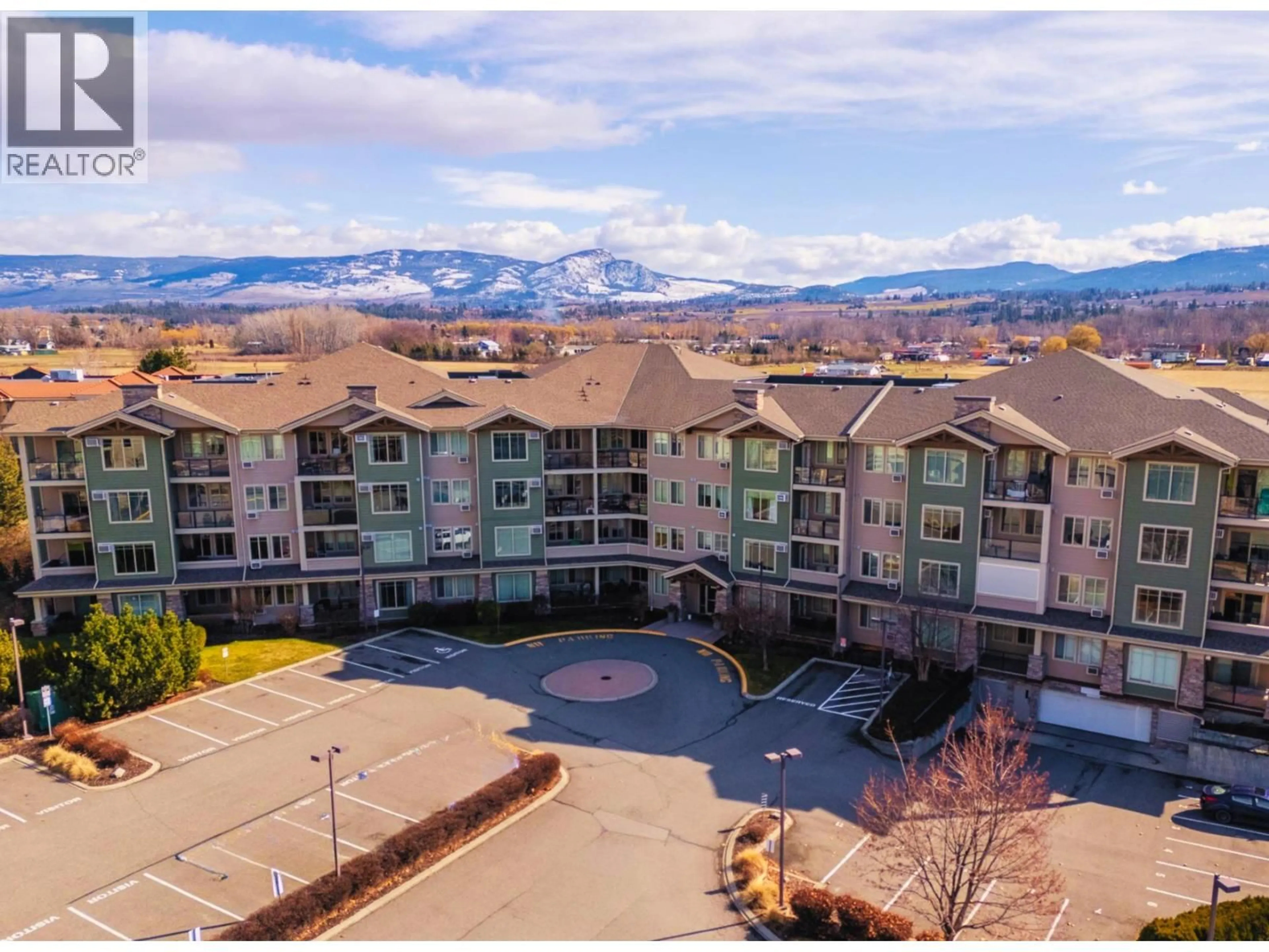 A pic from outside/outdoor area/front of a property/back of a property/a pic from drone, mountain view for 302 - 3735 CASORSO ROAD, Kelowna British Columbia V1W5G1