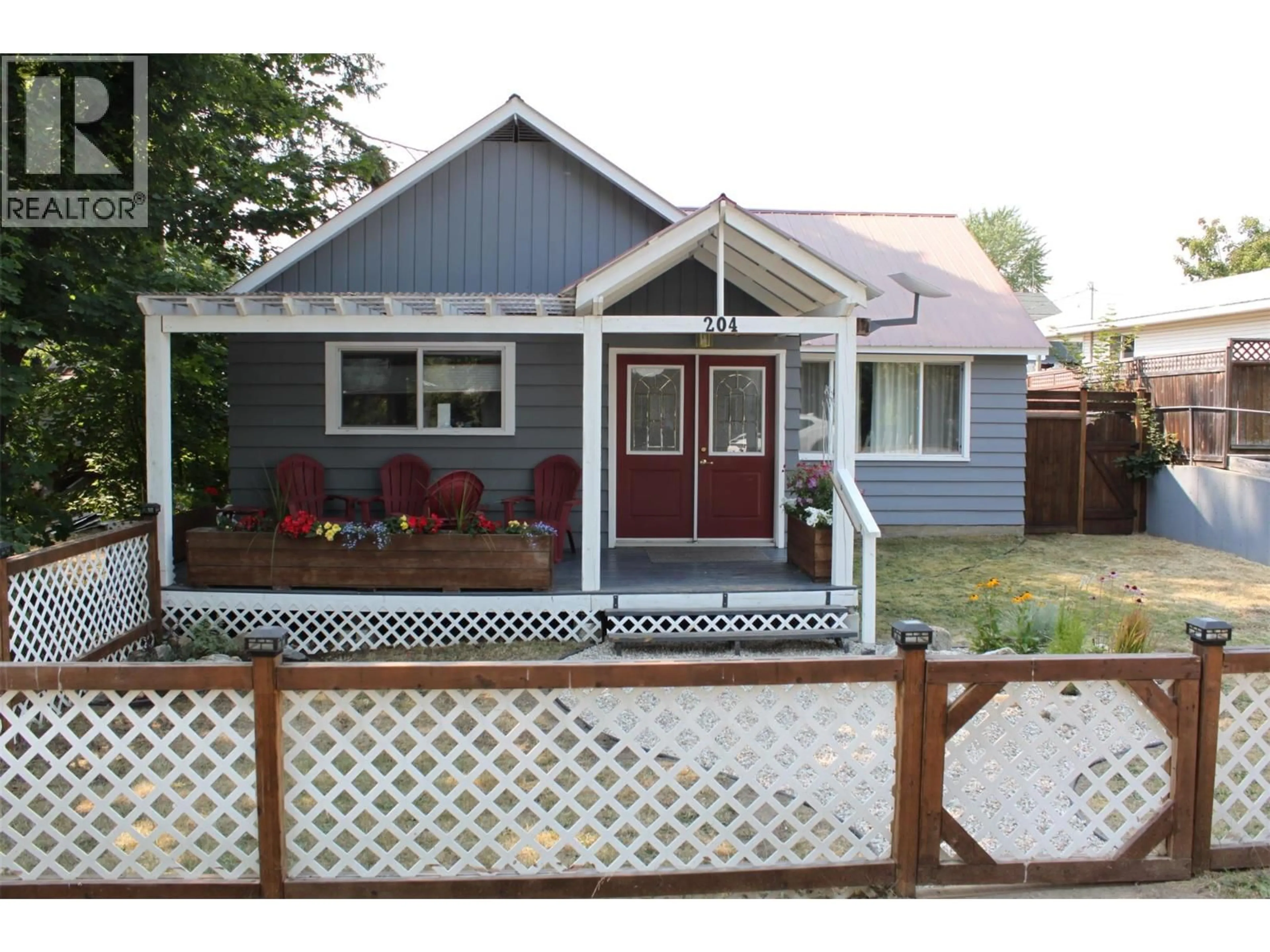 Home with vinyl exterior material, street for 204A 5TH AVENUE NORTHWEST, Nakusp British Columbia V0G1R0