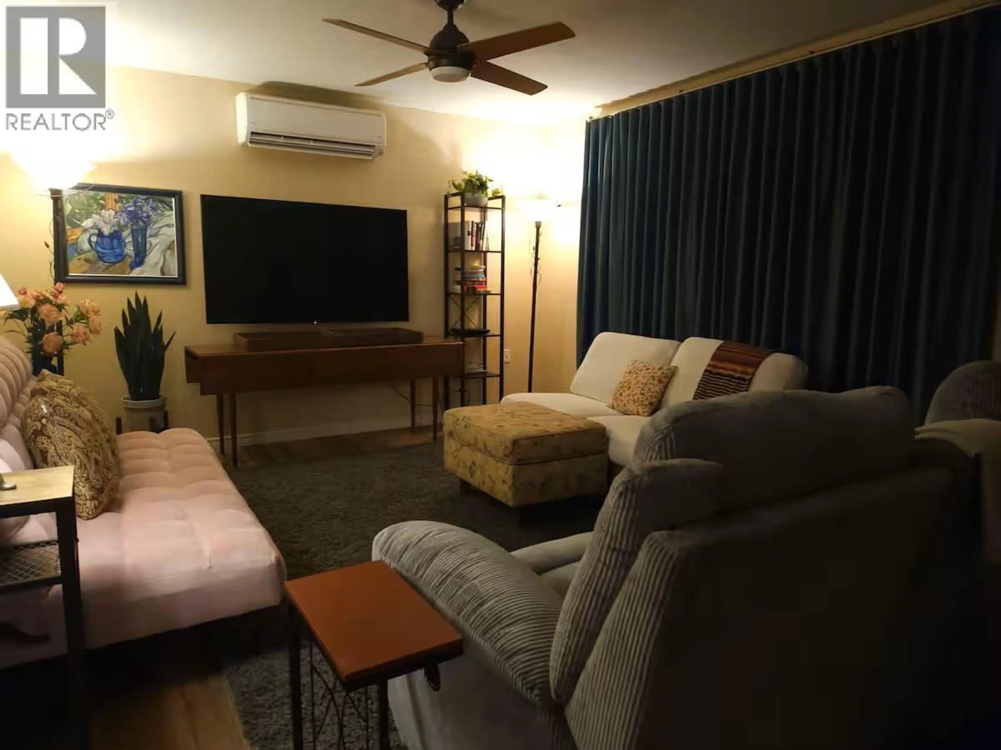 Living room with furniture, unknown for 204A 5TH AVENUE NORTHWEST, Nakusp British Columbia V0G1R0