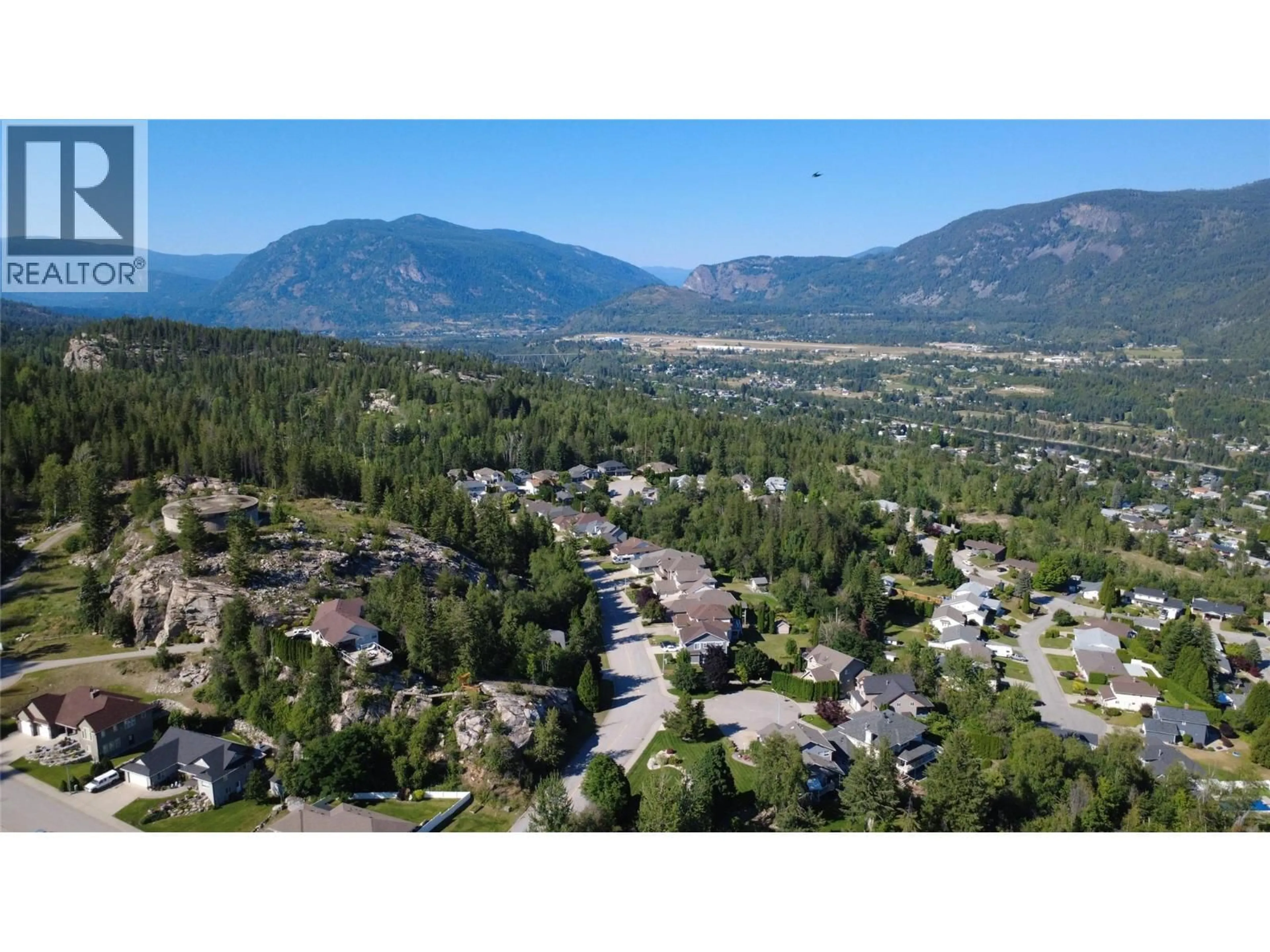 A pic from outside/outdoor area/front of a property/back of a property/a pic from drone, mountain view for 3583 14TH AVENUE, Castlegar British Columbia V1N4J2