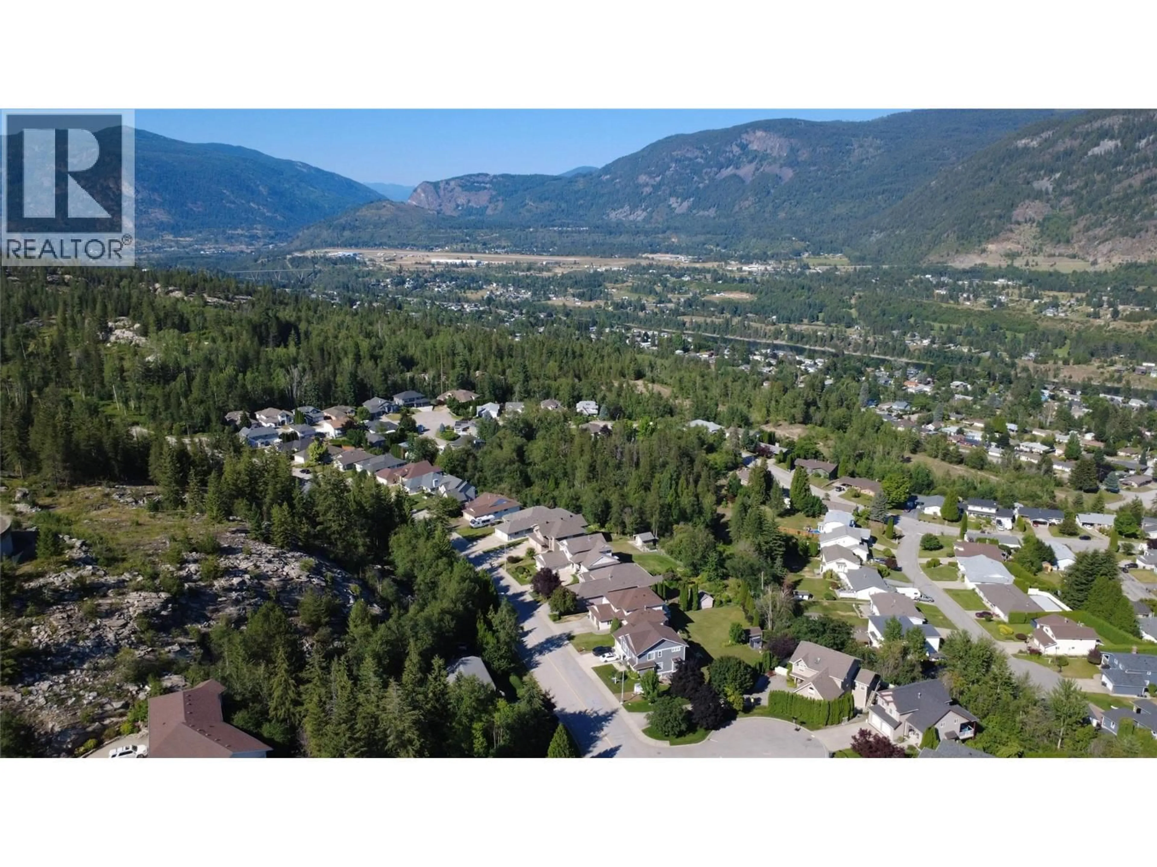 A pic from outside/outdoor area/front of a property/back of a property/a pic from drone, mountain view for 3583 14TH AVENUE, Castlegar British Columbia V1N4J2