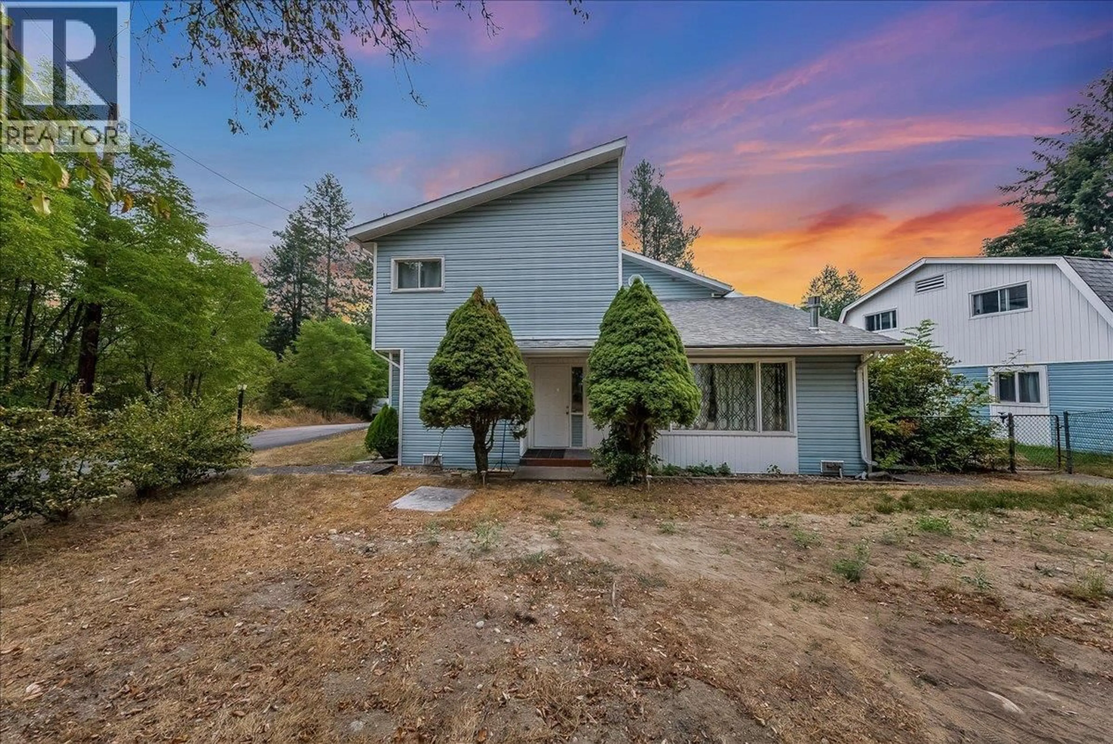 A pic from outside/outdoor area/front of a property/back of a property/a pic from drone, unknown for 814 16TH AVENUE, Genelle British Columbia V0G1G0
