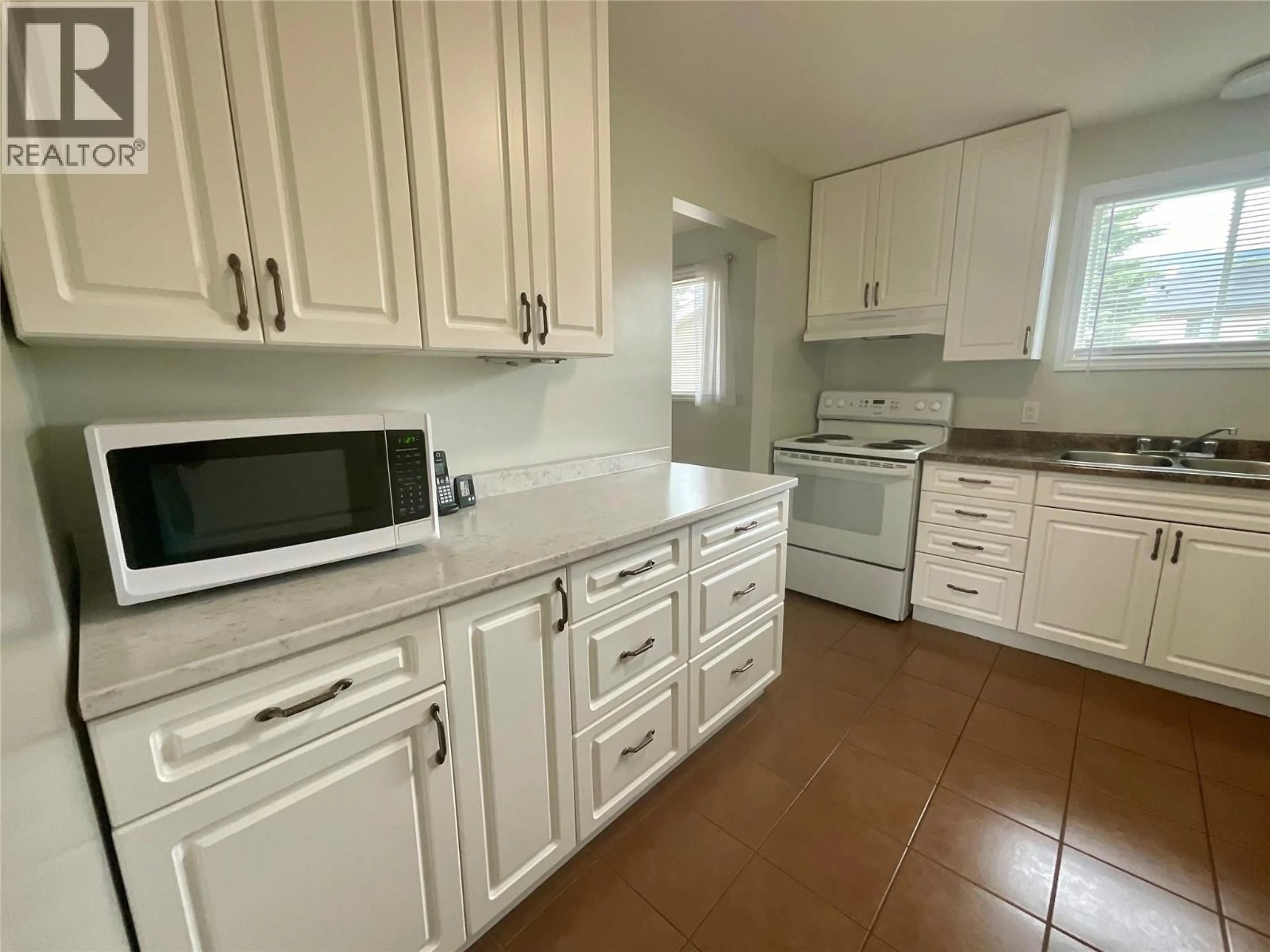 Standard kitchen, ceramic/tile floor for 60 VALLEYVIEW PLACE, Tumbler Ridge British Columbia V0C2W0