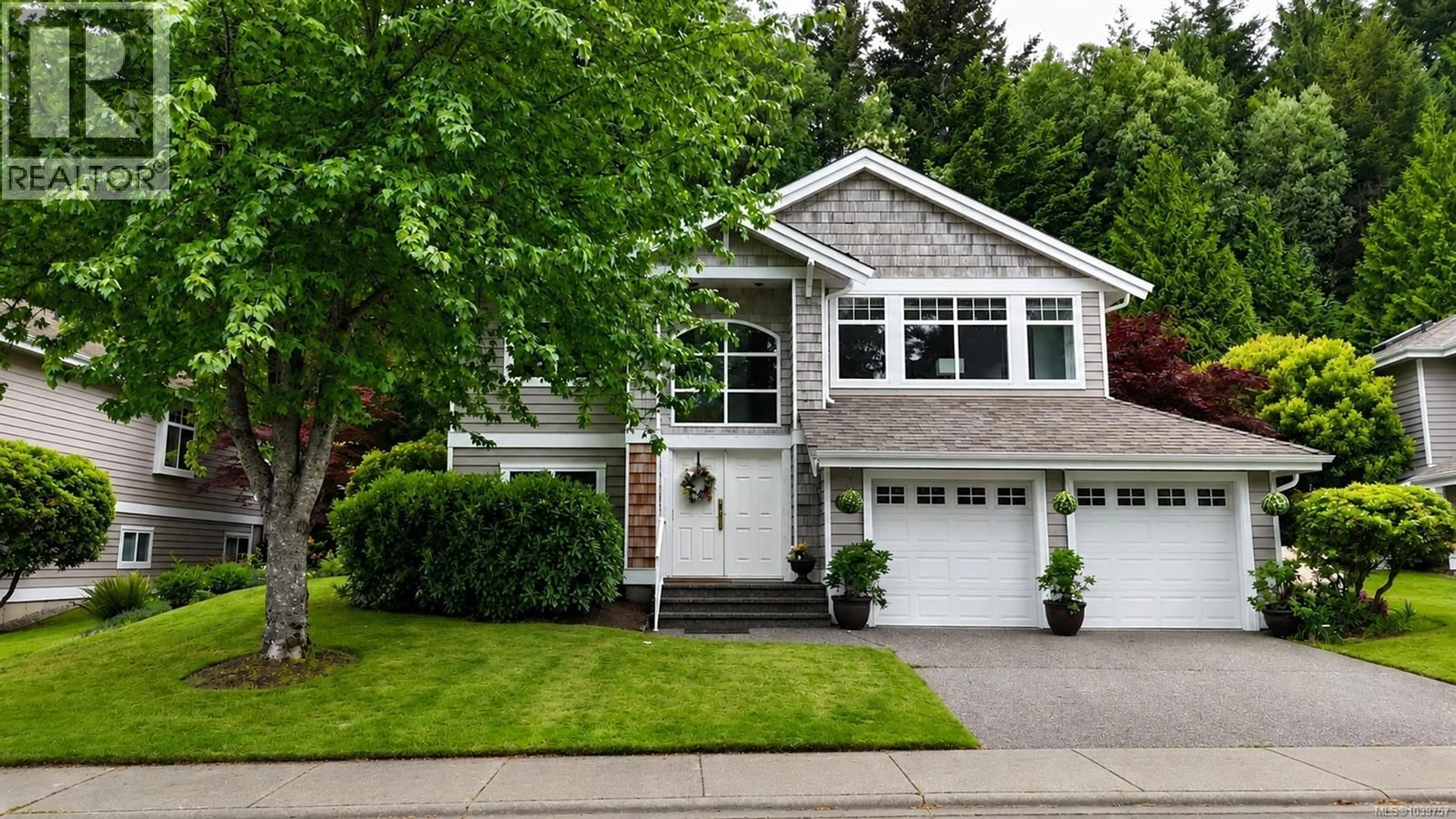 Home with vinyl exterior material, street for 1266 SATURNA DRIVE, Parksville British Columbia V9P2X6