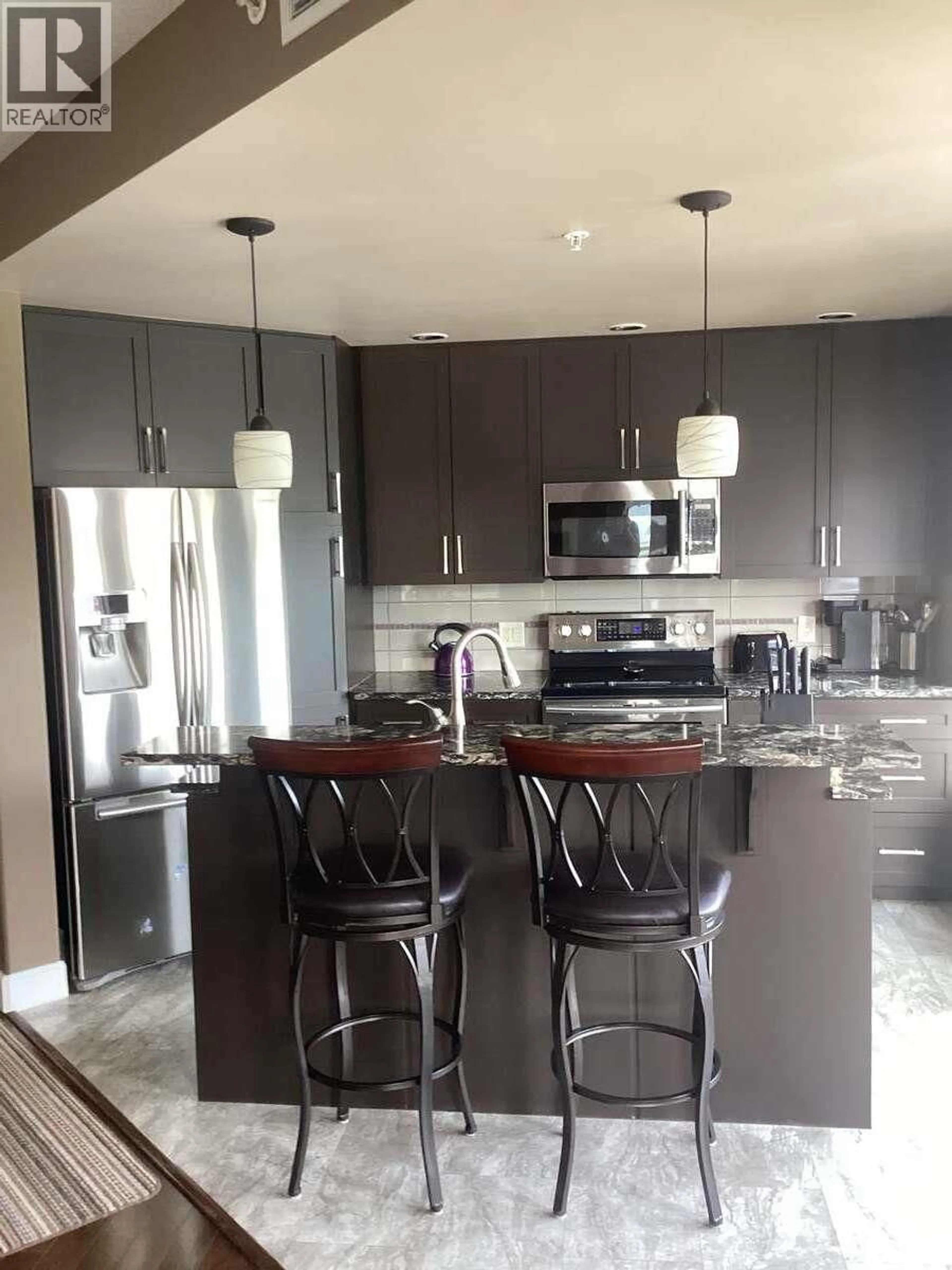 Contemporary kitchen, unknown for 801 - 1947 UNDERHILL STREET, Kelowna British Columbia V1X7Z5