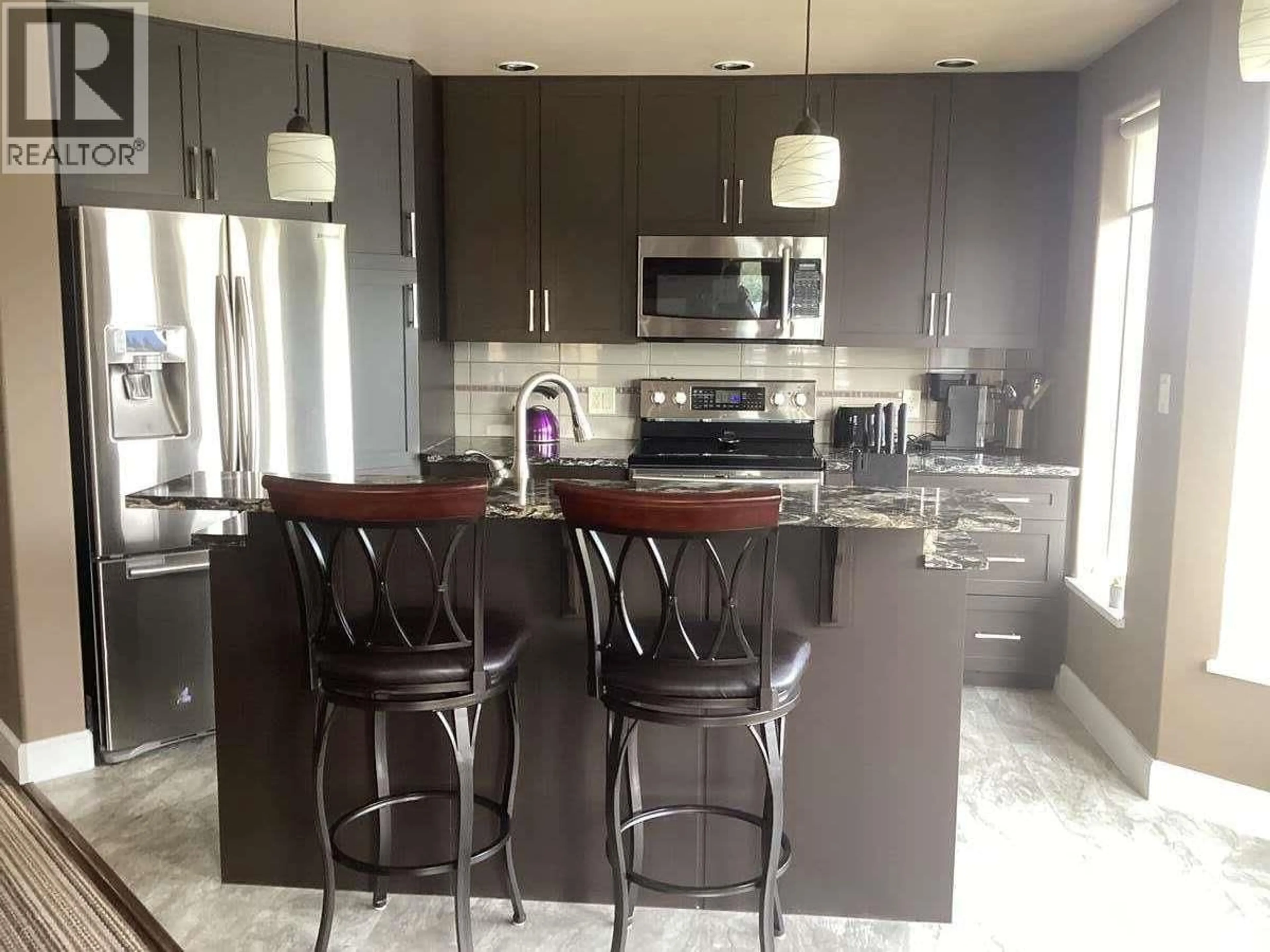 Contemporary kitchen, unknown for 801 - 1947 UNDERHILL STREET, Kelowna British Columbia V1X7Z5
