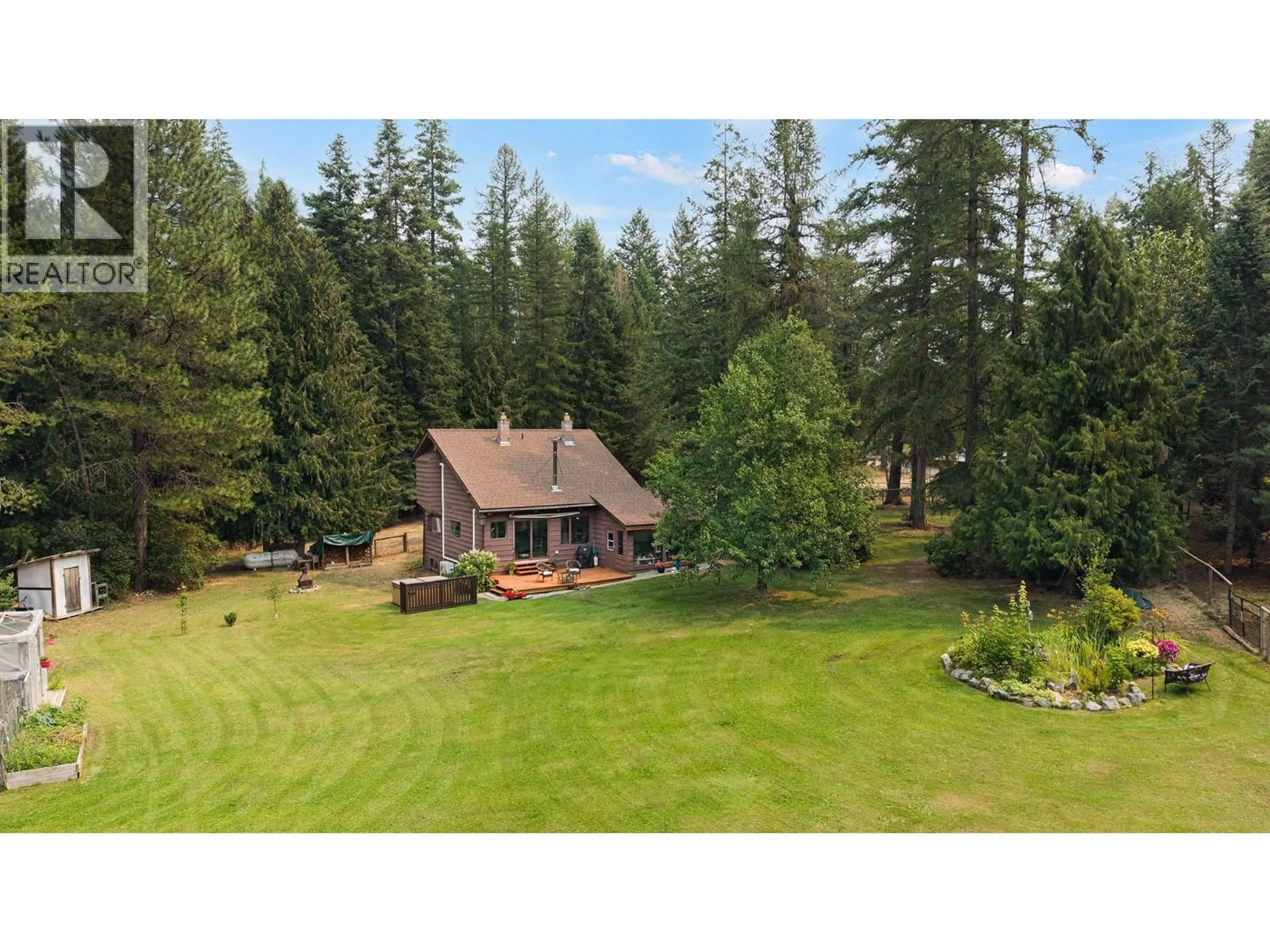 A pic from outside/outdoor area/front of a property/back of a property/a pic from drone, forest/trees view for 5724 CRYSTAL ROAD, Kitchener British Columbia V0B1W1