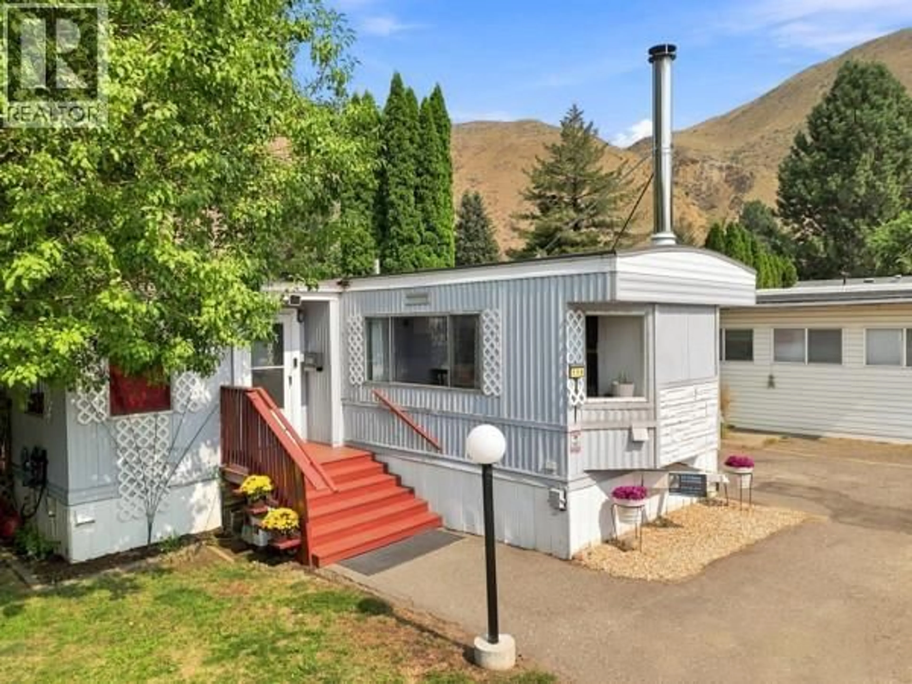 A pic from outside/outdoor area/front of a property/back of a property/a pic from drone, mountain view for 119 - 2401 ORD ROAD, Kamloops British Columbia V2B7V8