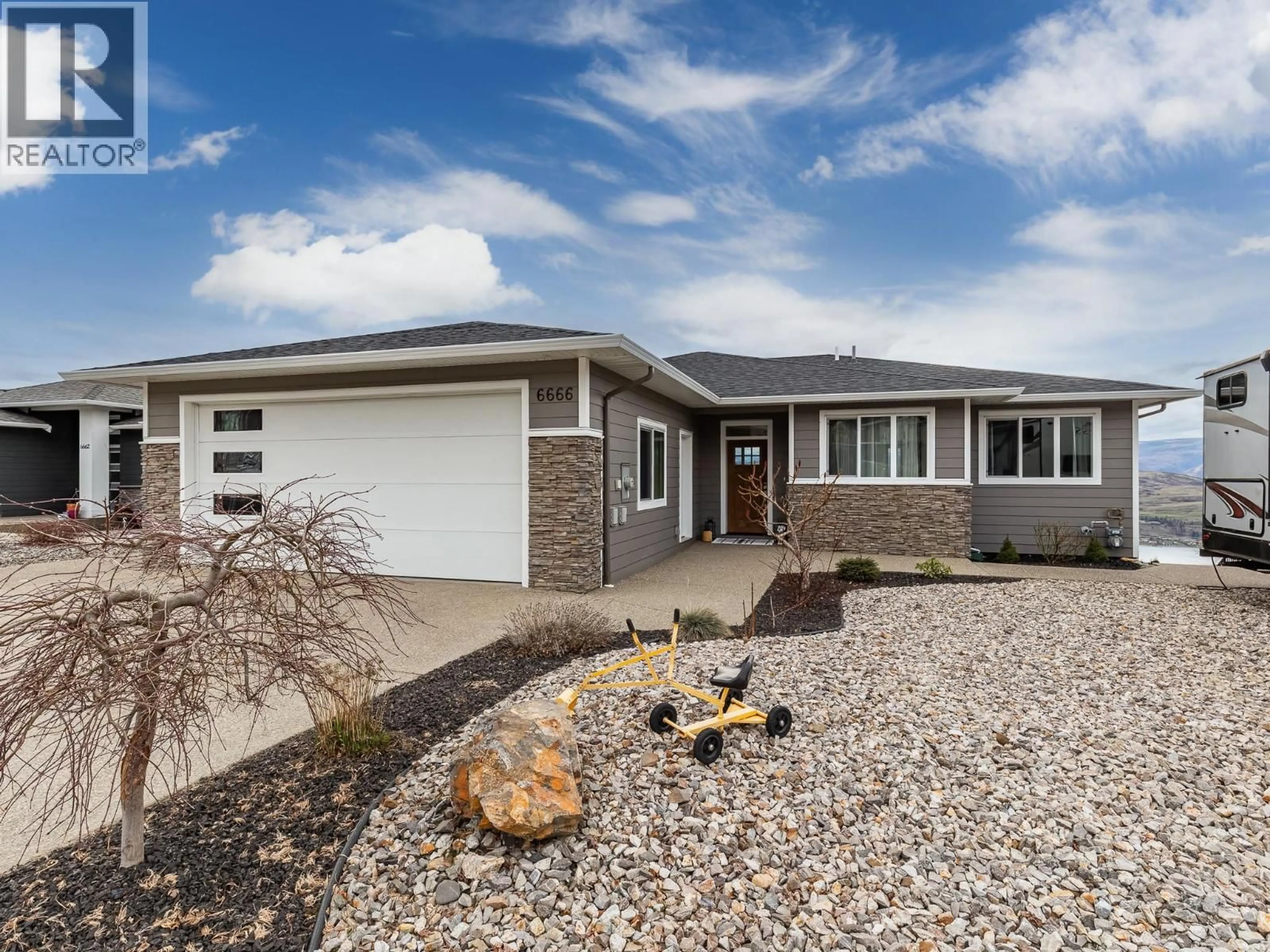 Home with vinyl exterior material, street for 6666 BLACKCOMB WAY, Vernon British Columbia V1B0A2
