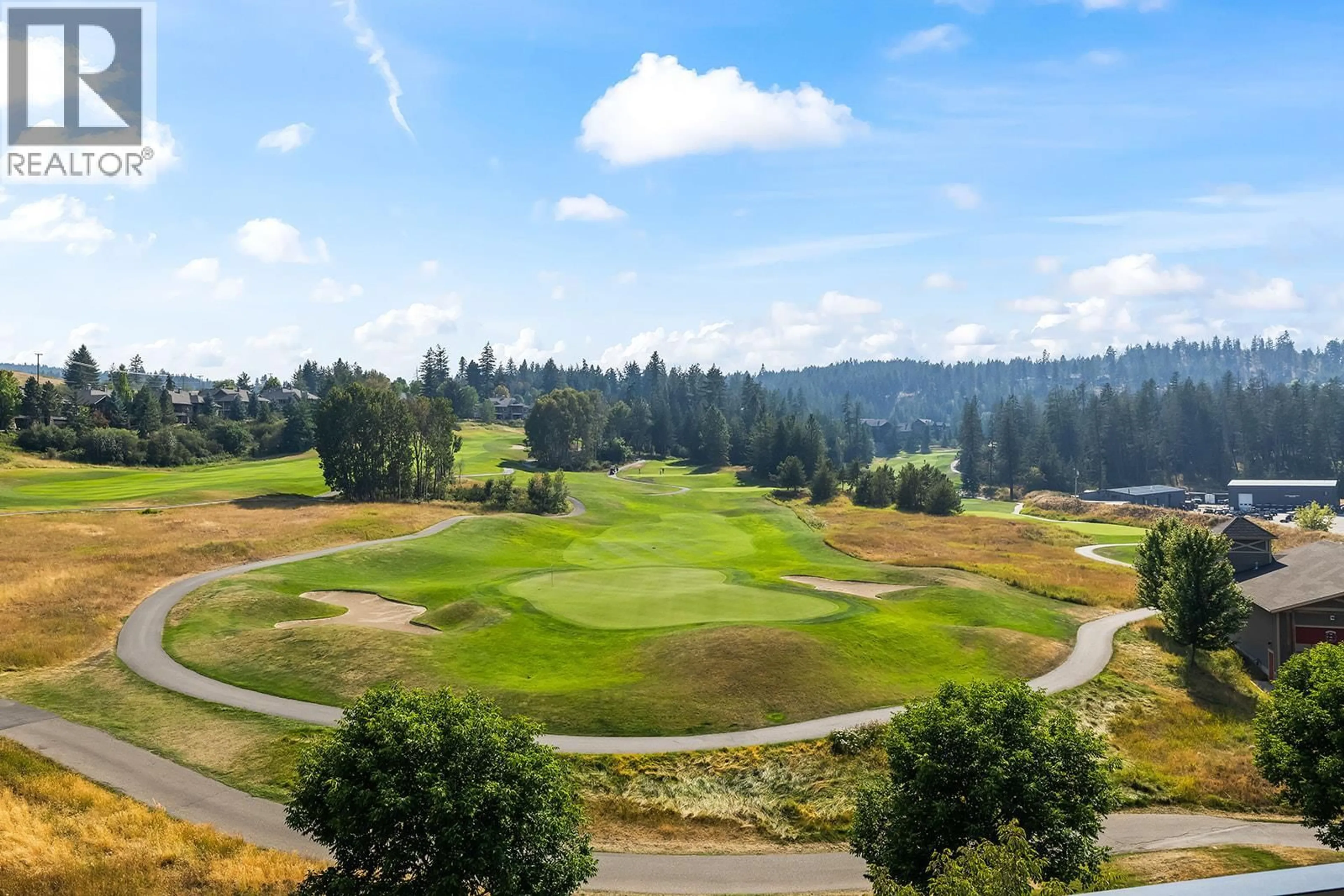 A pic from outside/outdoor area/front of a property/back of a property/a pic from drone, unknown for 506 - 75 PREDATOR RIDGE DRIVE, Vernon British Columbia V1H1G4