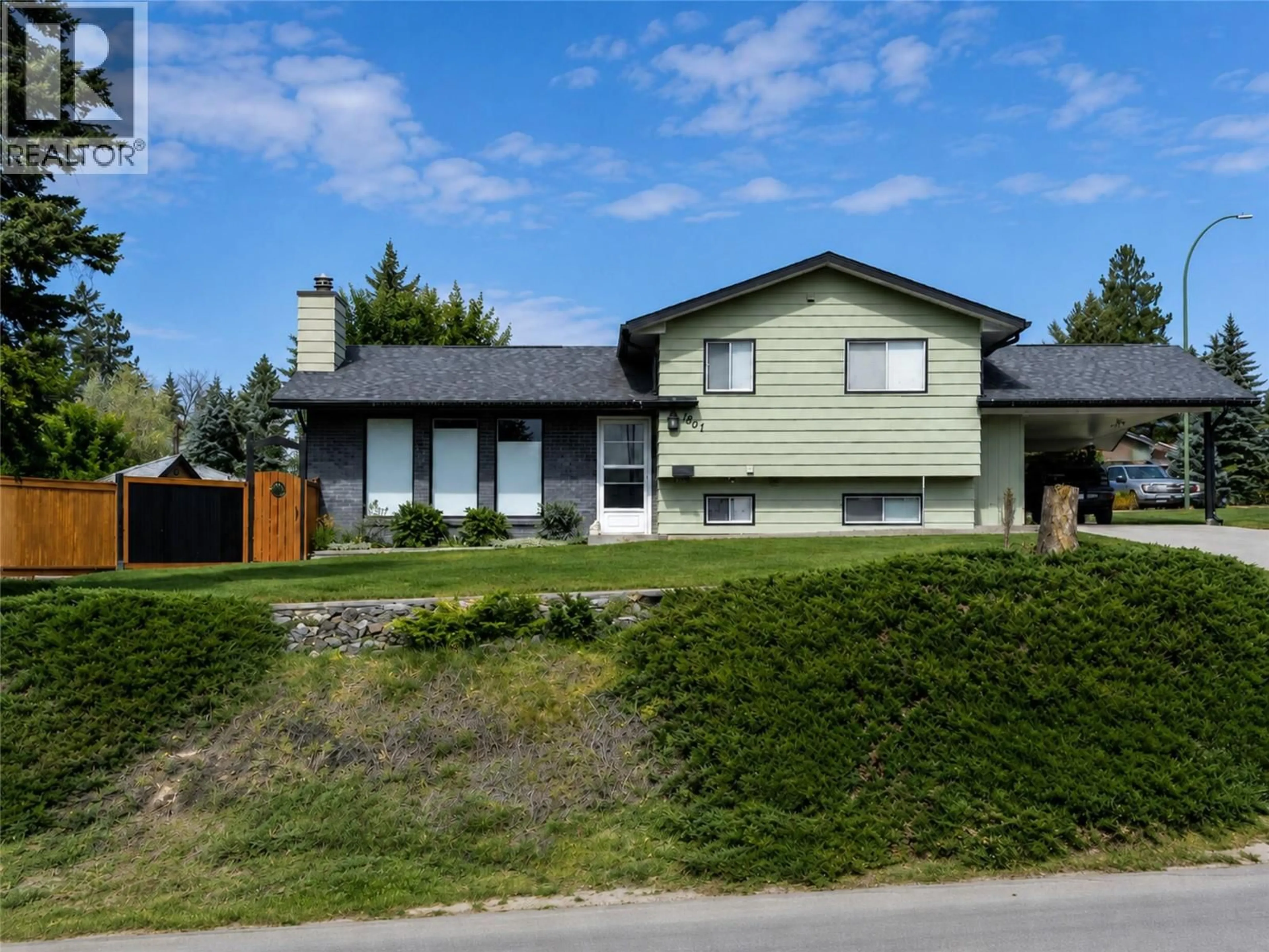 A pic from outside/outdoor area/front of a property/back of a property/a pic from drone, street for 1801 MT SINCLAIR AVENUE NORTH, Cranbrook British Columbia V1C6B8