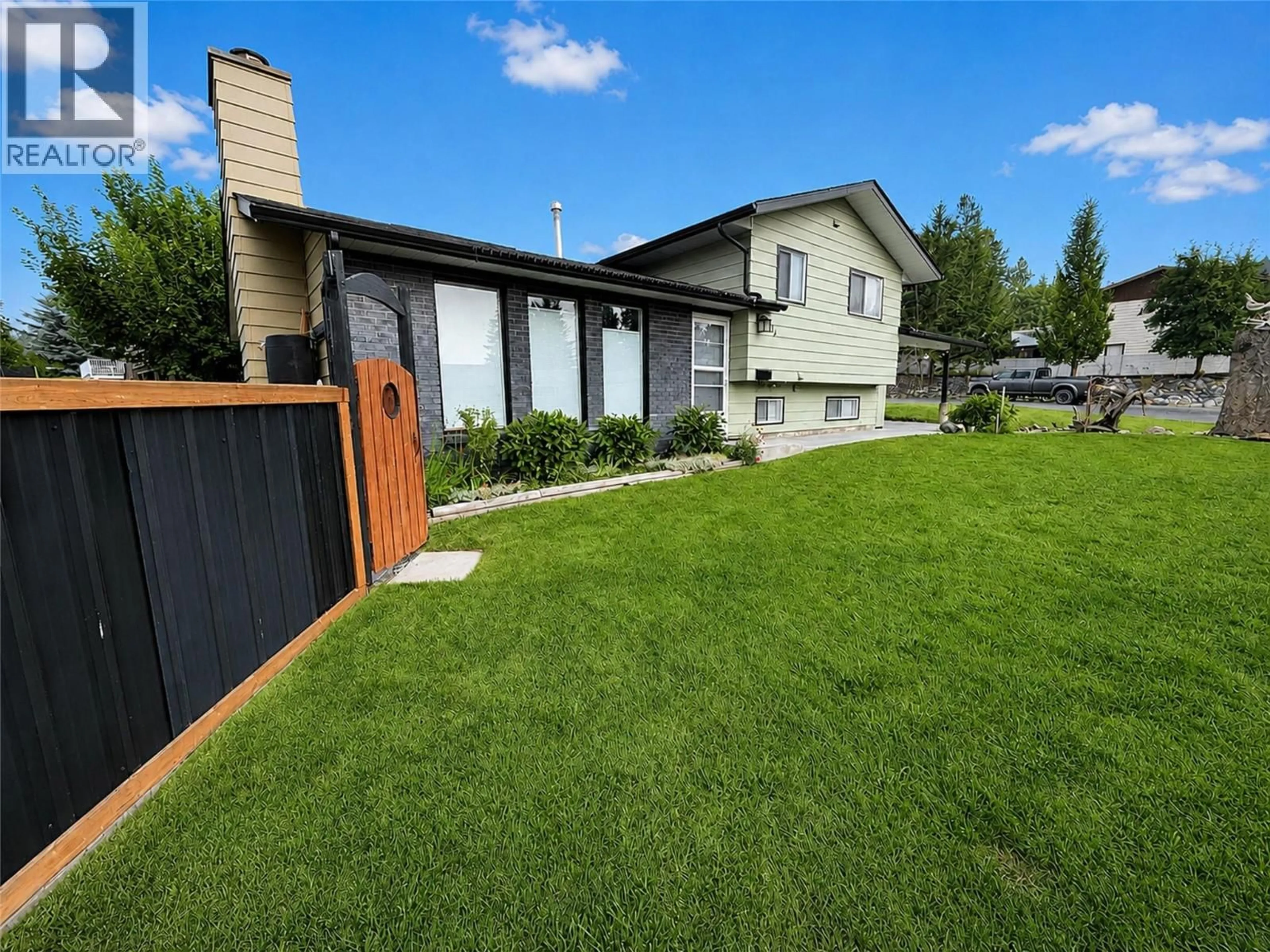 A pic from outside/outdoor area/front of a property/back of a property/a pic from drone, street for 1801 MT SINCLAIR AVENUE NORTH, Cranbrook British Columbia V1C6B8