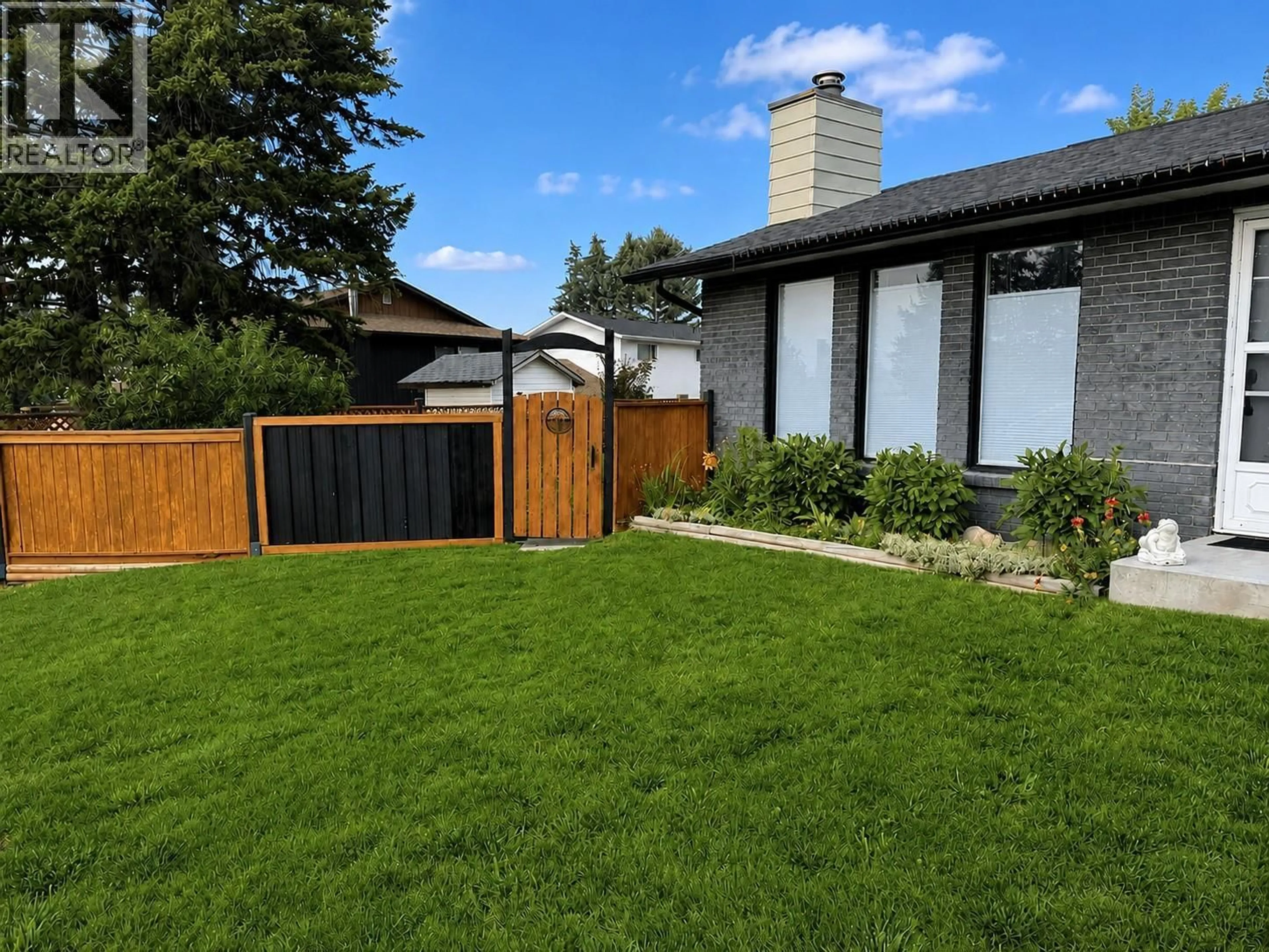 A pic from outside/outdoor area/front of a property/back of a property/a pic from drone, street for 1801 MT SINCLAIR AVENUE NORTH, Cranbrook British Columbia V1C6B8