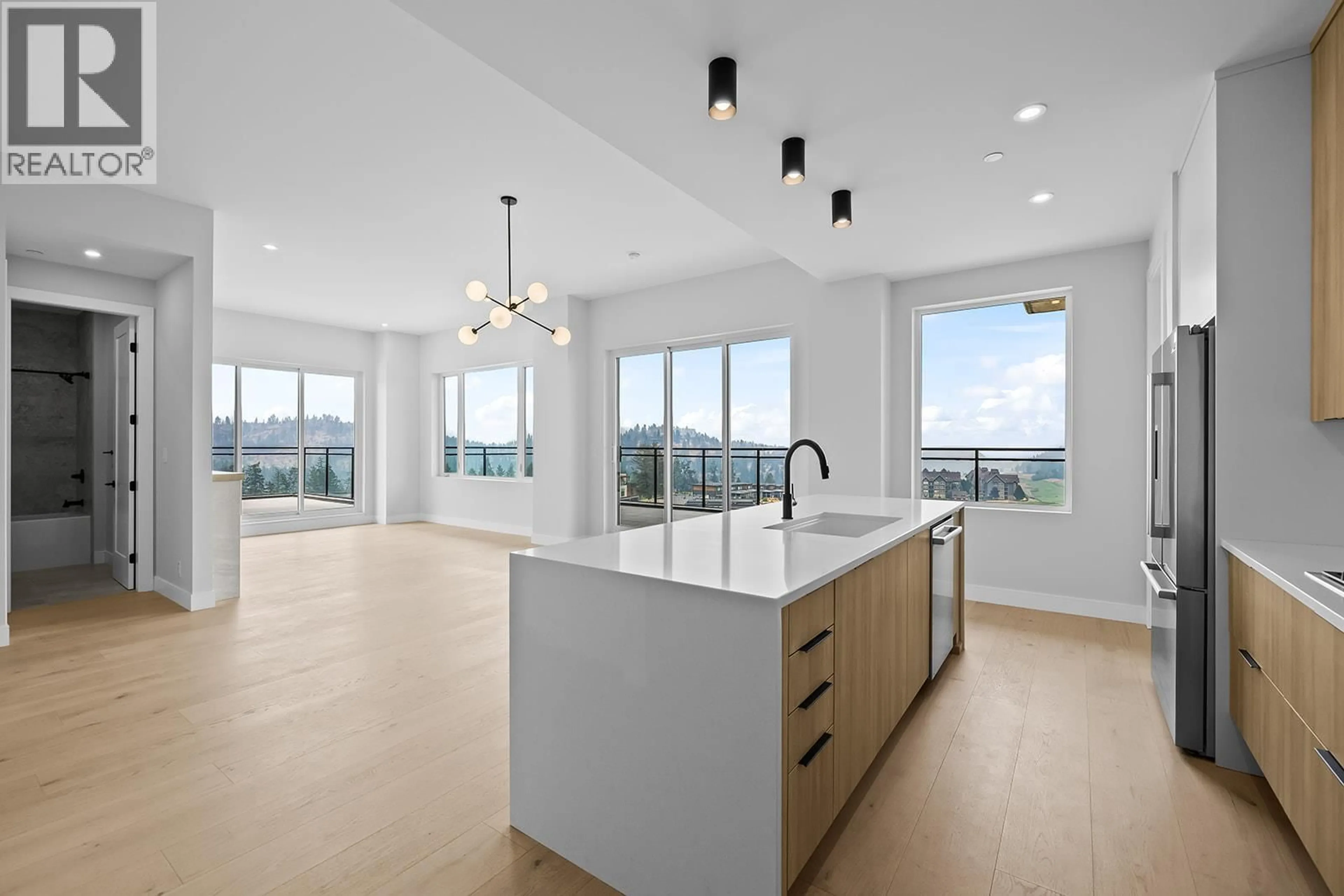 Open concept kitchen, unknown for 602 - 75 PREDATOR RIDGE DRIVE, Vernon British Columbia V1H1G4