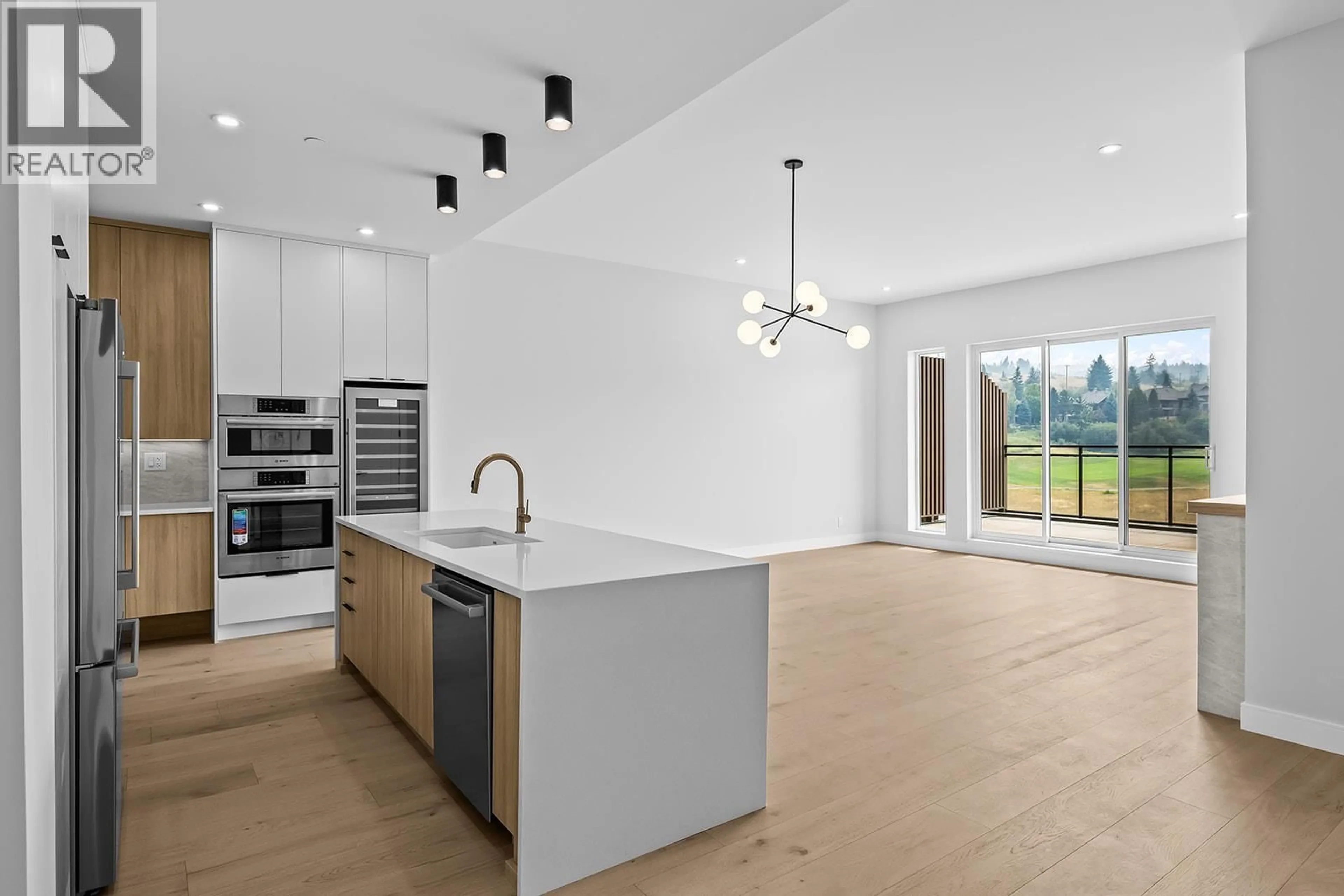Open concept kitchen, unknown for 604 - 75 PREDATOR RIDGE DRIVE, Vernon British Columbia V1H1G4