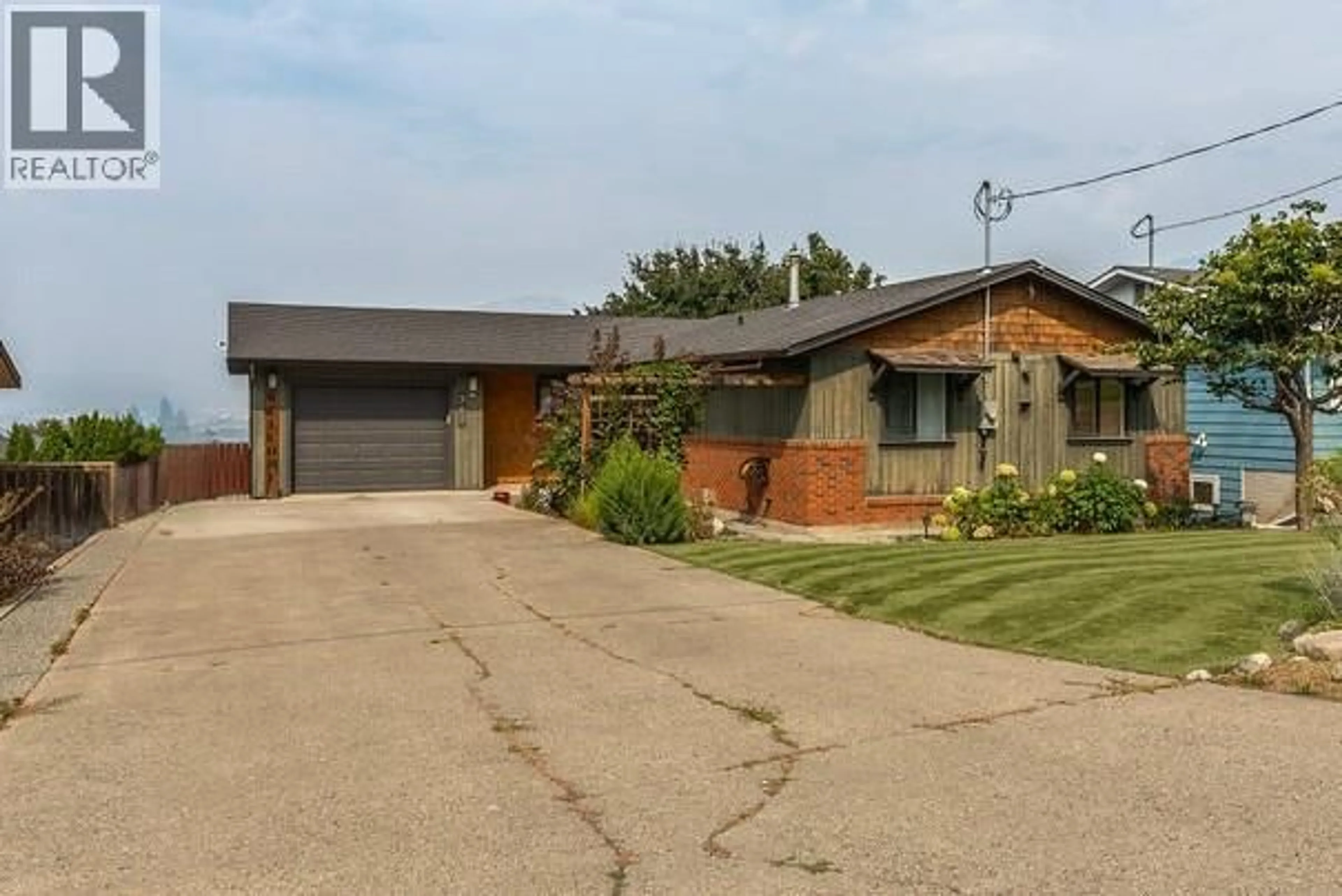 Home with brick exterior material, street for 760 ARBUTUS STREET, Kamloops British Columbia V2C5W5