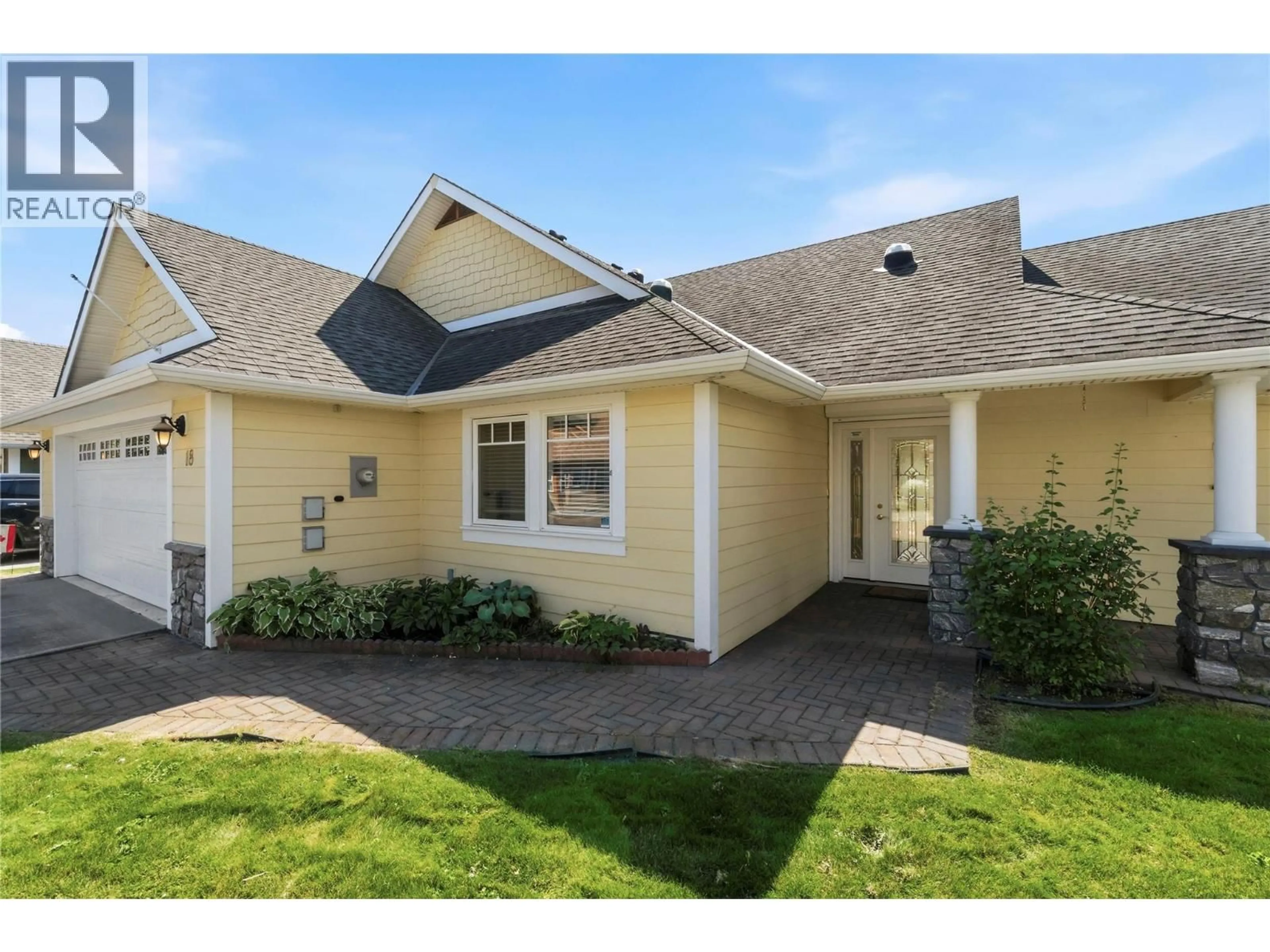 Home with vinyl exterior material, street for 18 - 1231 10 STREET SOUTHWEST, Salmon Arm British Columbia V1E0A5