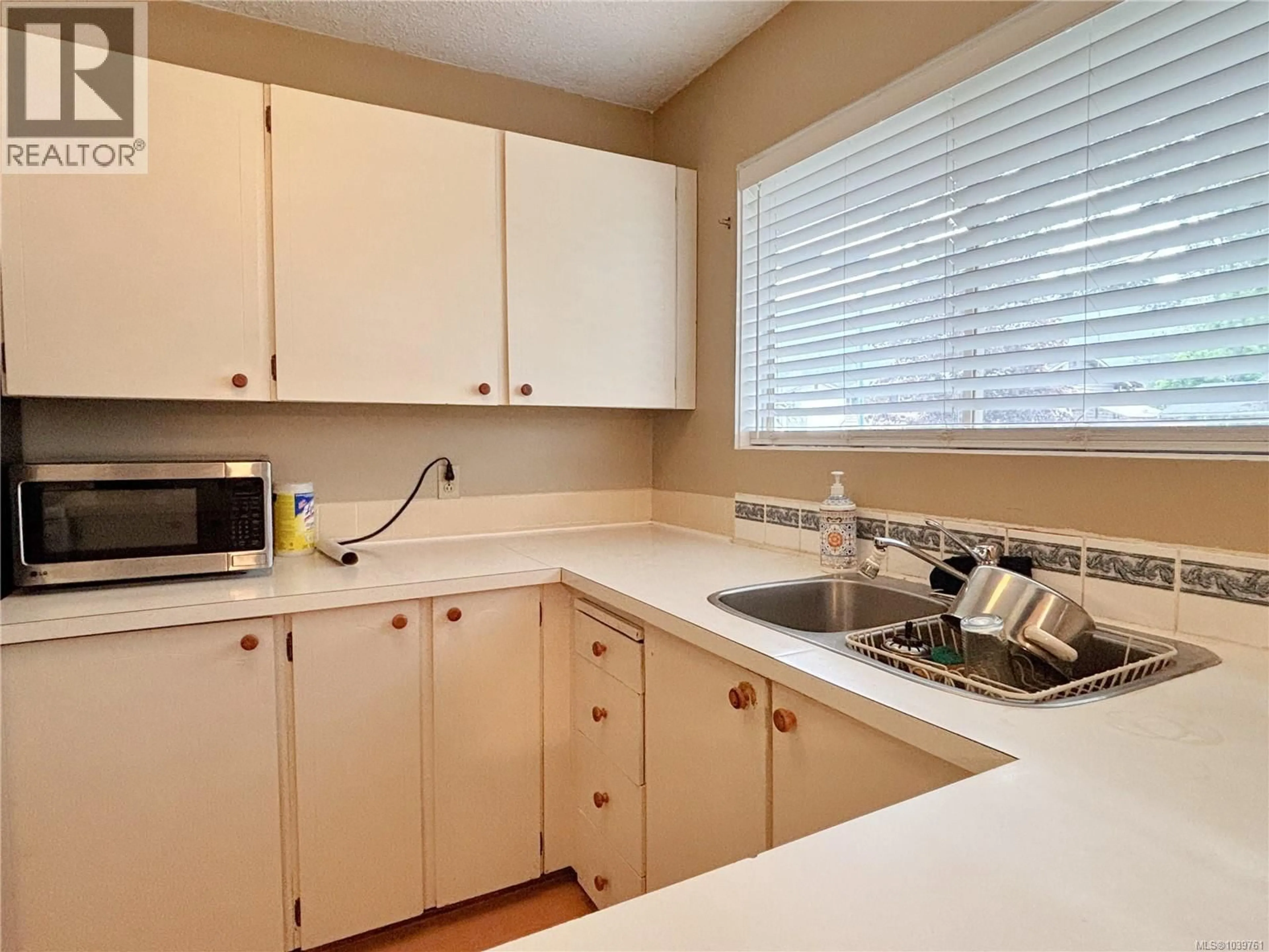 Standard kitchen, wood/laminate floor for 380 ALDER STREET, Gold River British Columbia V0P1G0