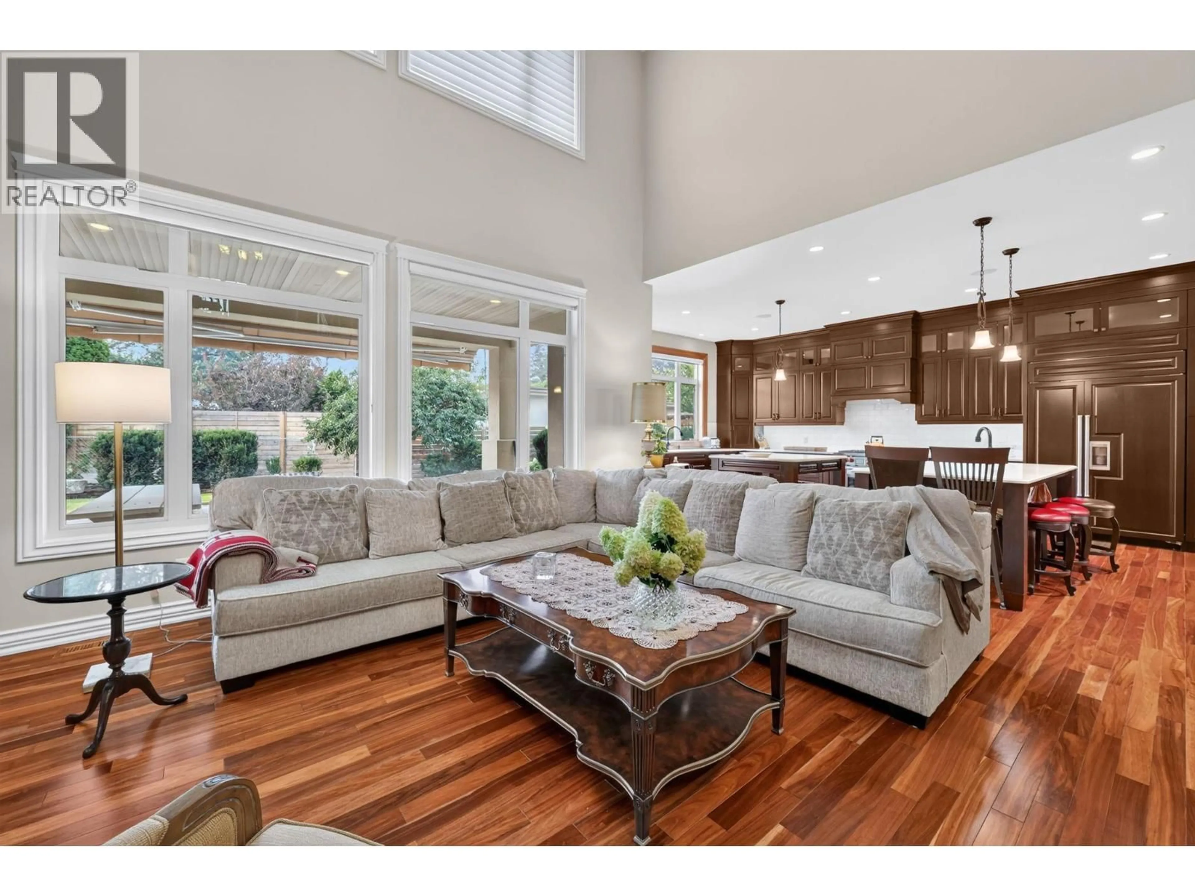 Living room with furniture, wood/laminate floor for 523 METCALFE AVENUE, Kelowna British Columbia V1W5K8