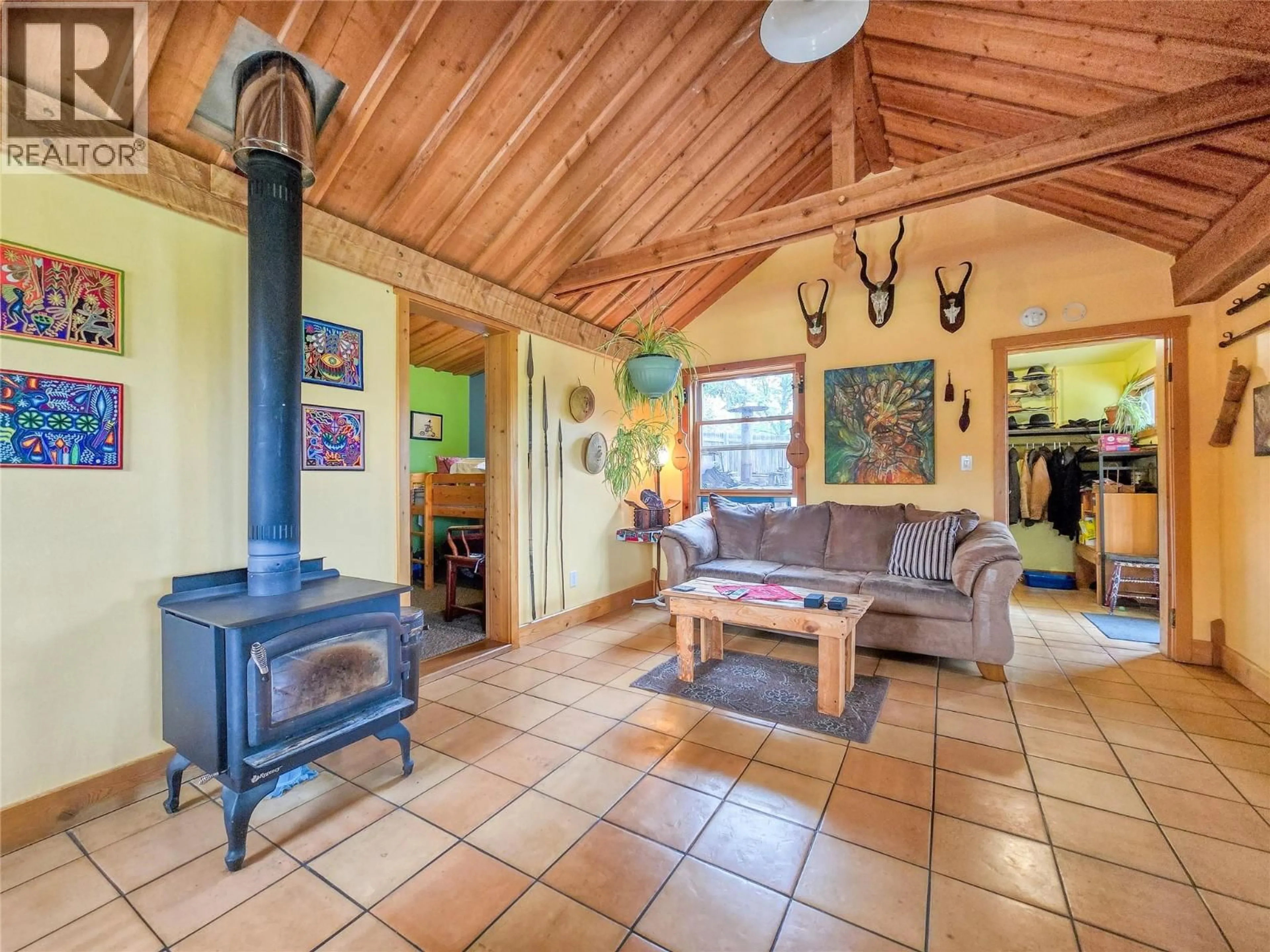 Living room with furniture, ceramic/tile floor for 9498 WESTSIDE ROAD, Invermere British Columbia V0A1K5