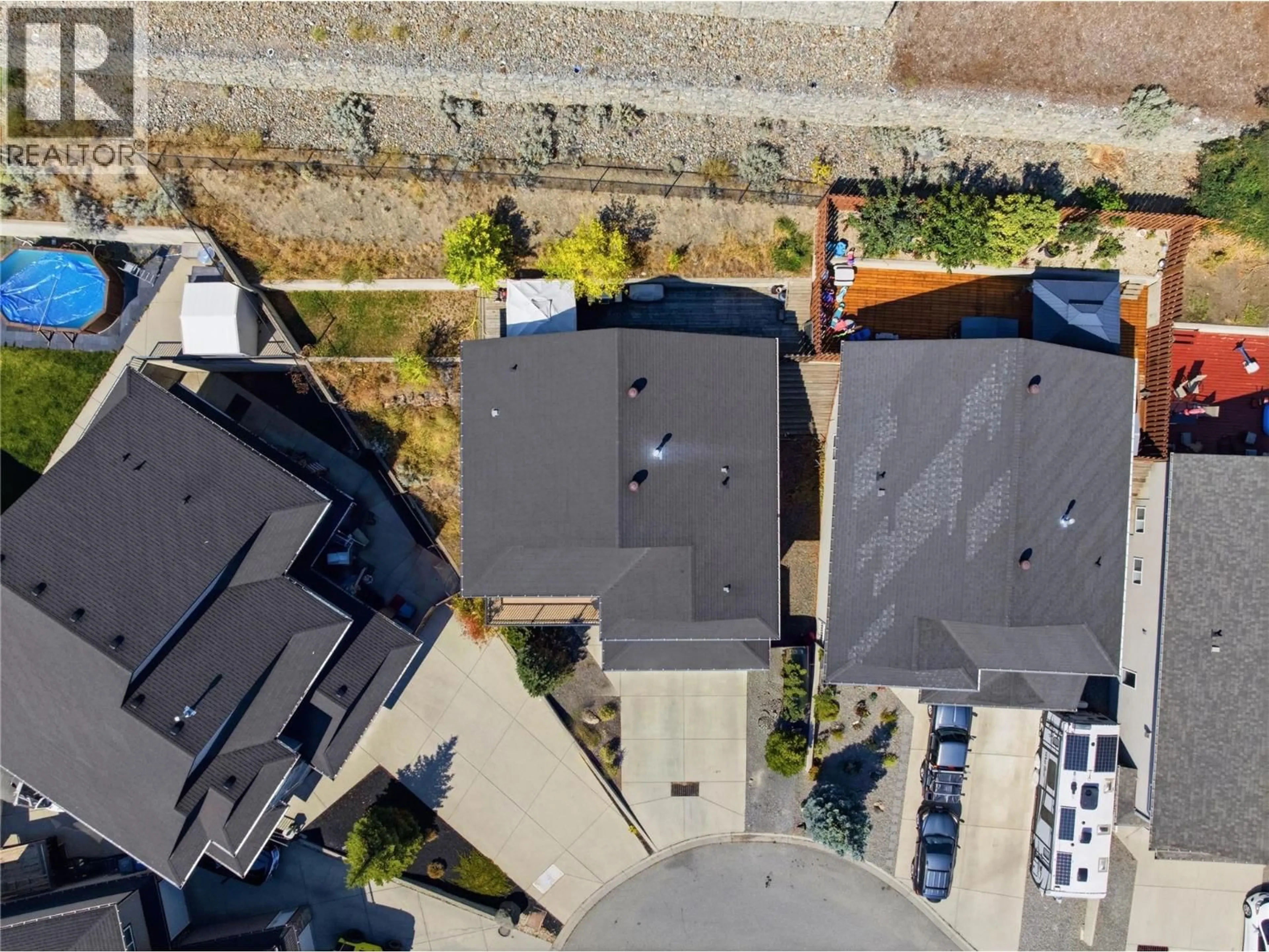 A pic from outside/outdoor area/front of a property/back of a property/a pic from drone, street for 1887 GROUSE COURT, Kamloops British Columbia V2B8S9