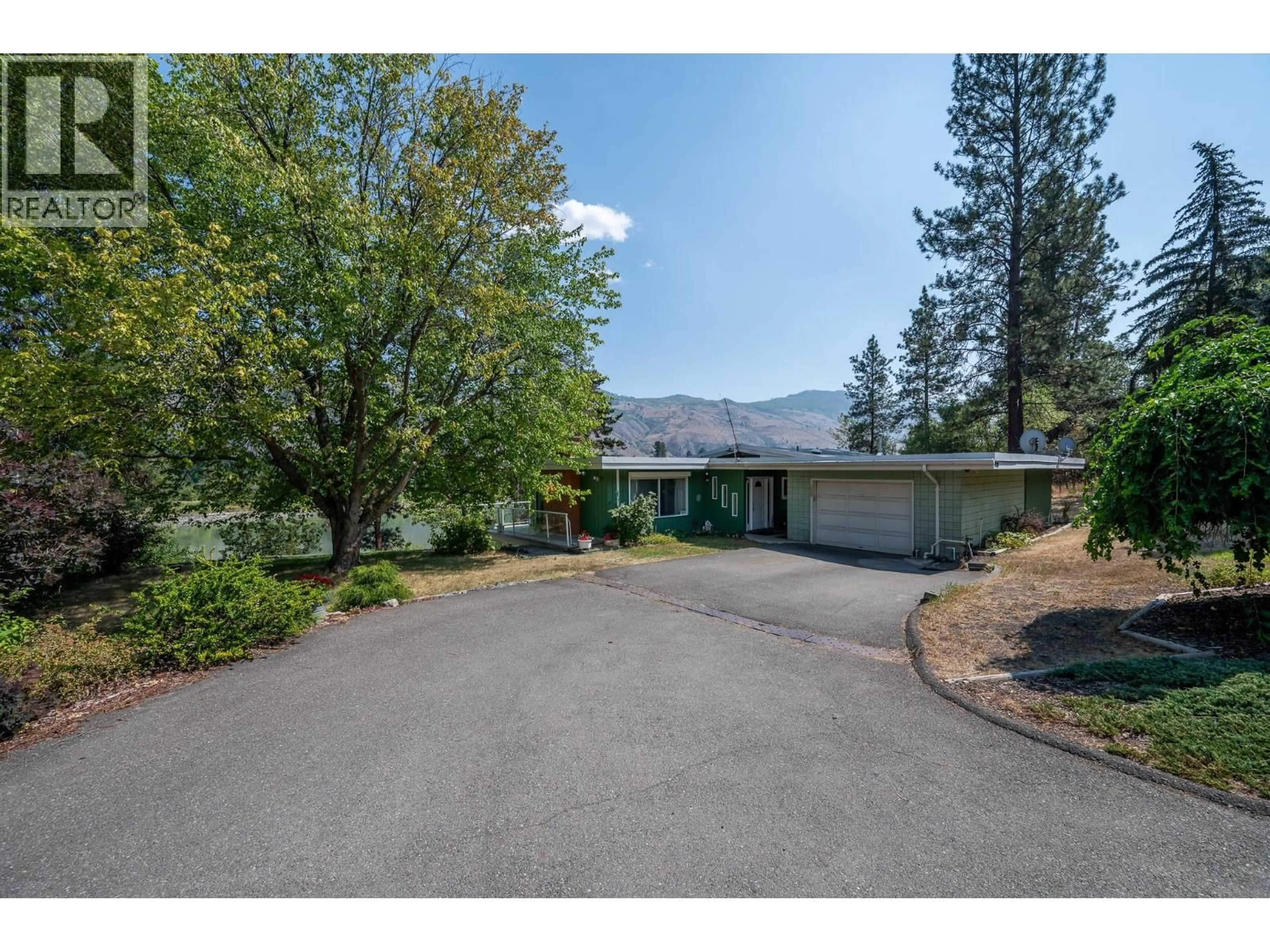 A pic from outside/outdoor area/front of a property/back of a property/a pic from drone, mountain view for 4707 WESTSYDE ROAD, Kamloops British Columbia V2B8N4