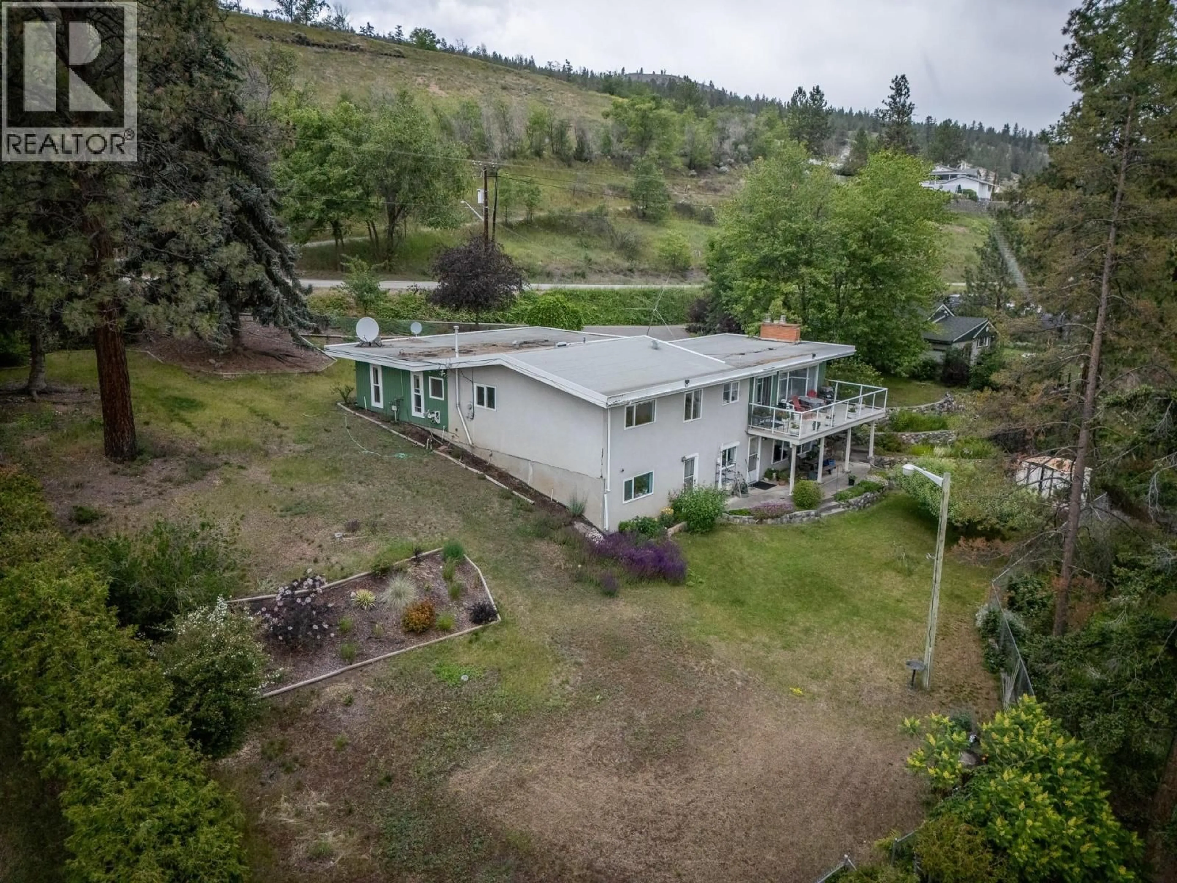 A pic from outside/outdoor area/front of a property/back of a property/a pic from drone, unknown for 4707 WESTSYDE ROAD, Kamloops British Columbia V2B8N4
