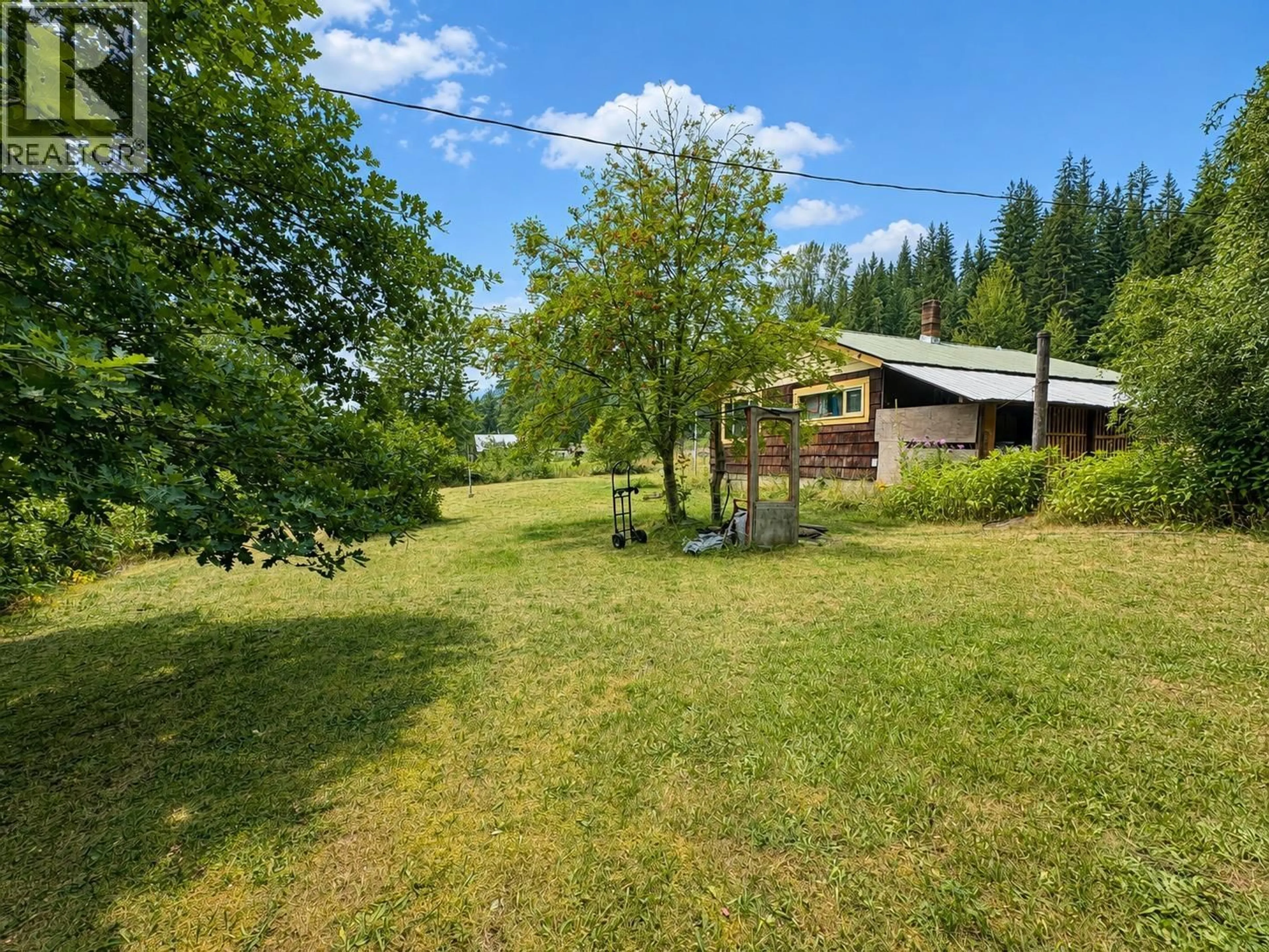 A pic from outside/outdoor area/front of a property/back of a property/a pic from drone, forest/trees view for 3233 MABEL LAKE ROAD, Enderby British Columbia V4Y4L4