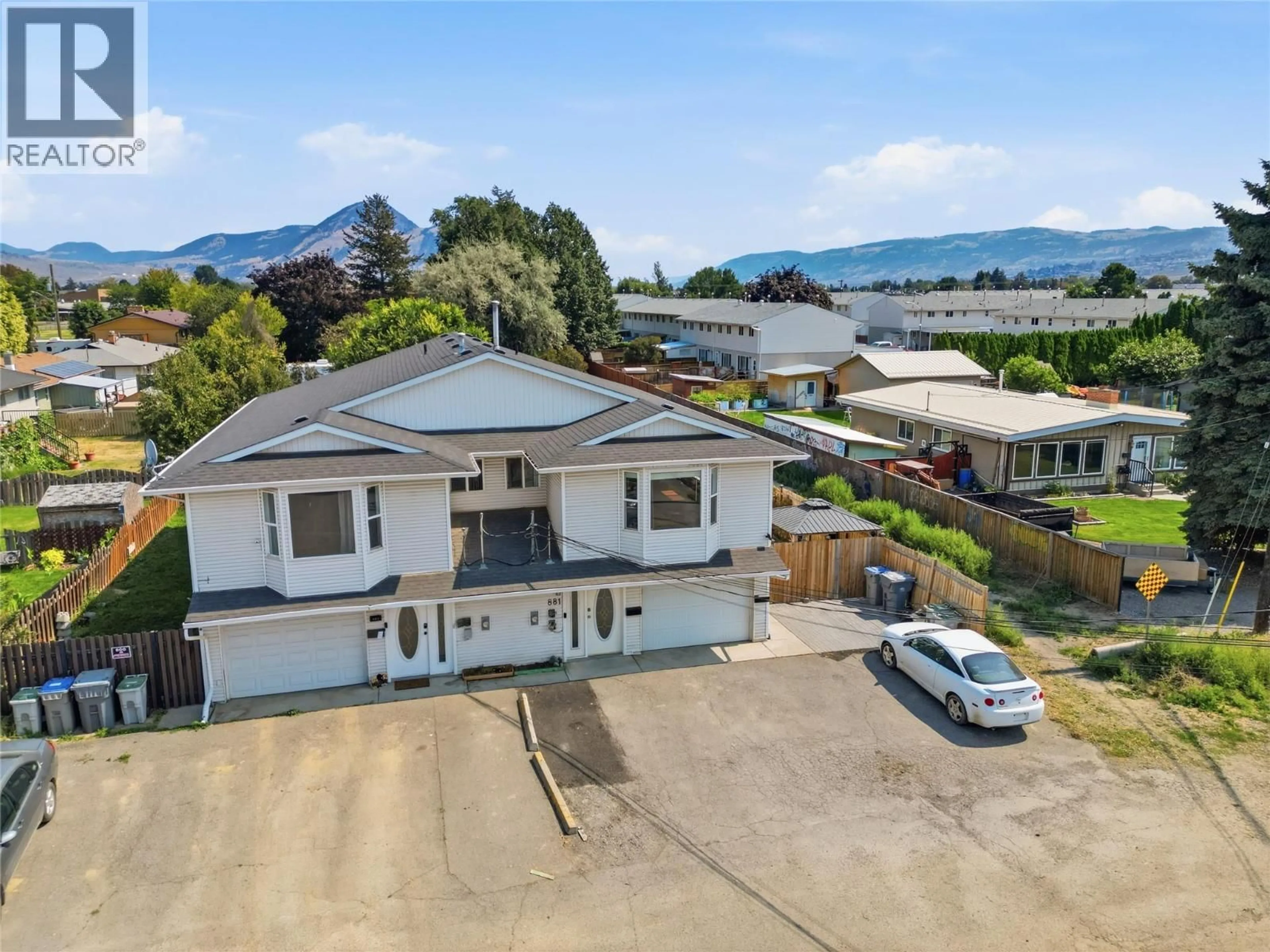 A pic from outside/outdoor area/front of a property/back of a property/a pic from drone, mountain view for 881 EVERGREEN PLACE, Kamloops British Columbia V2B5M7