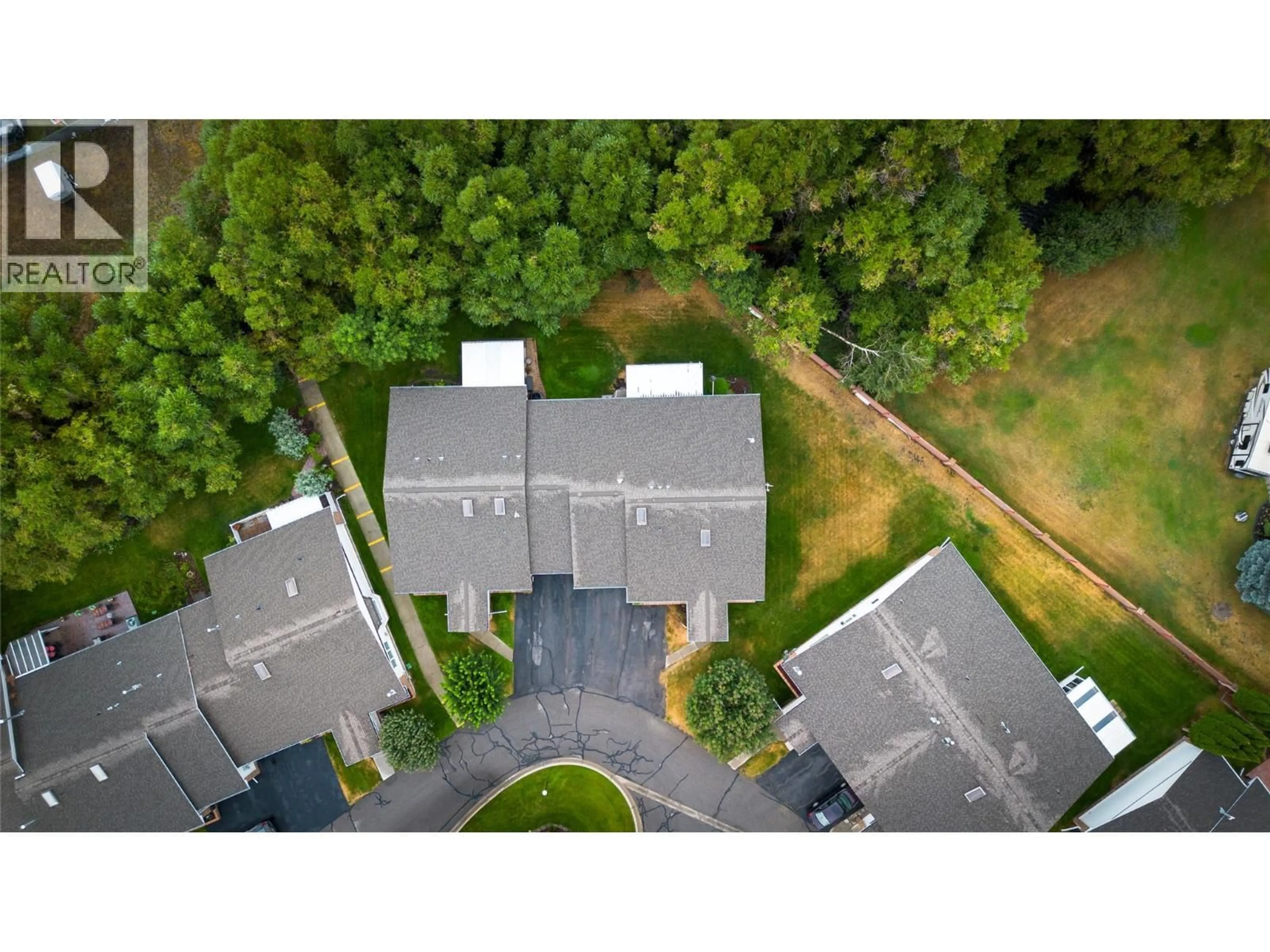 A pic from outside/outdoor area/front of a property/back of a property/a pic from drone, unknown for 46 - 2025 KOKANEE DRIVE, Cranbrook British Columbia V1C6J2