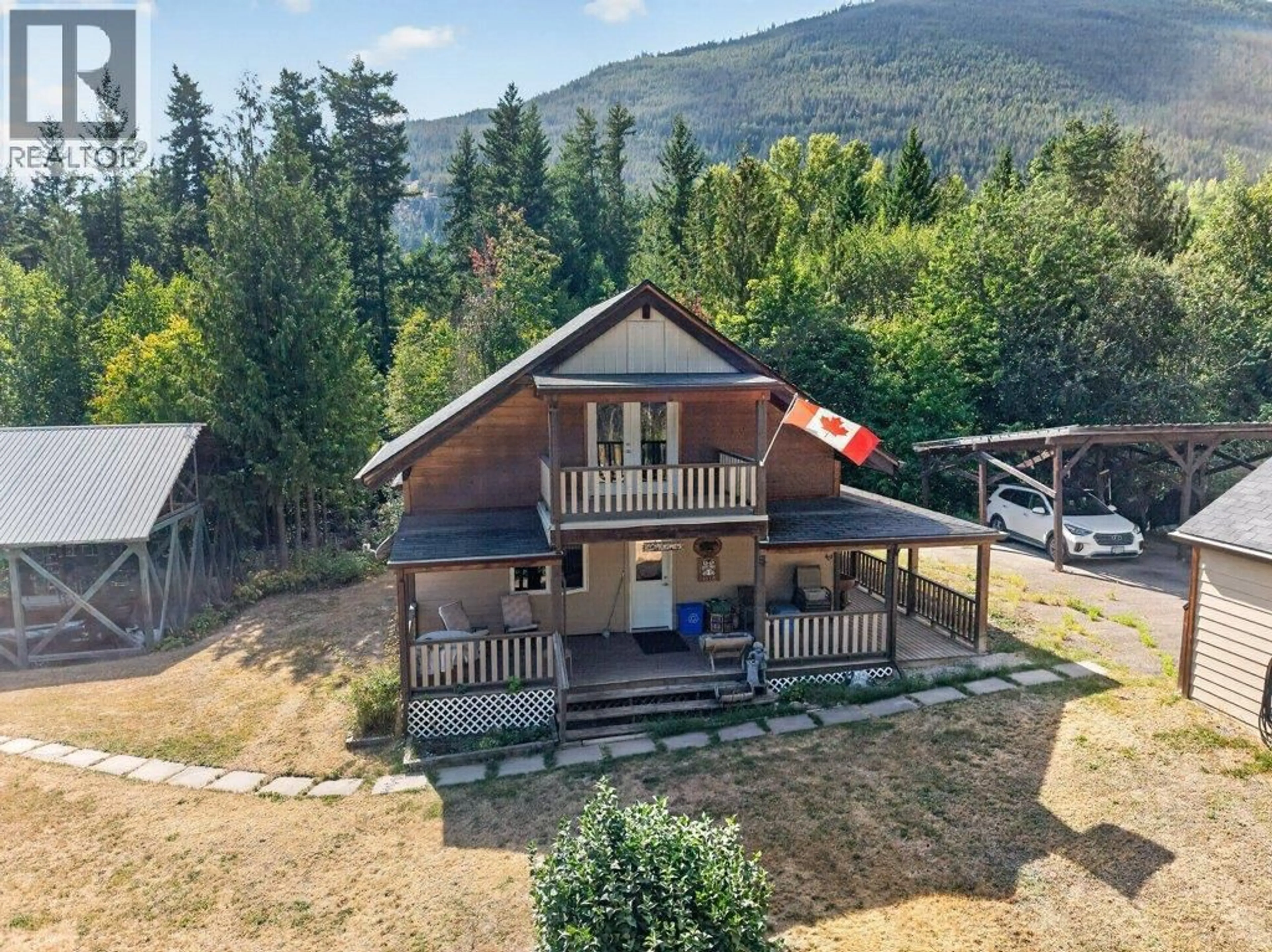A pic from outside/outdoor area/front of a property/back of a property/a pic from drone, mountain view for 411 CHRISTISON ROAD SOUTHWEST, Salmon Arm British Columbia V1E3B4
