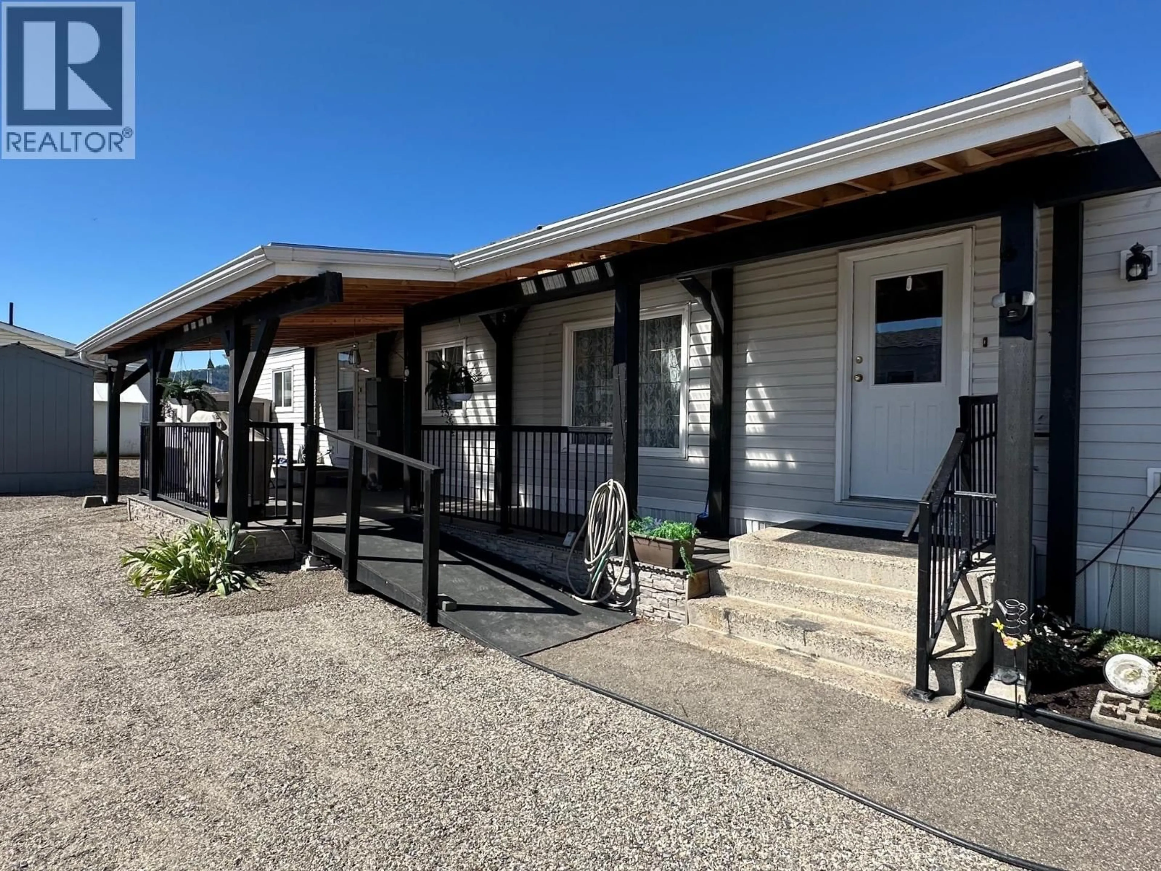 A pic from outside/outdoor area/front of a property/back of a property/a pic from drone, street for 26 - 12560 WESTSIDE ROAD, Vernon British Columbia V1H1S9