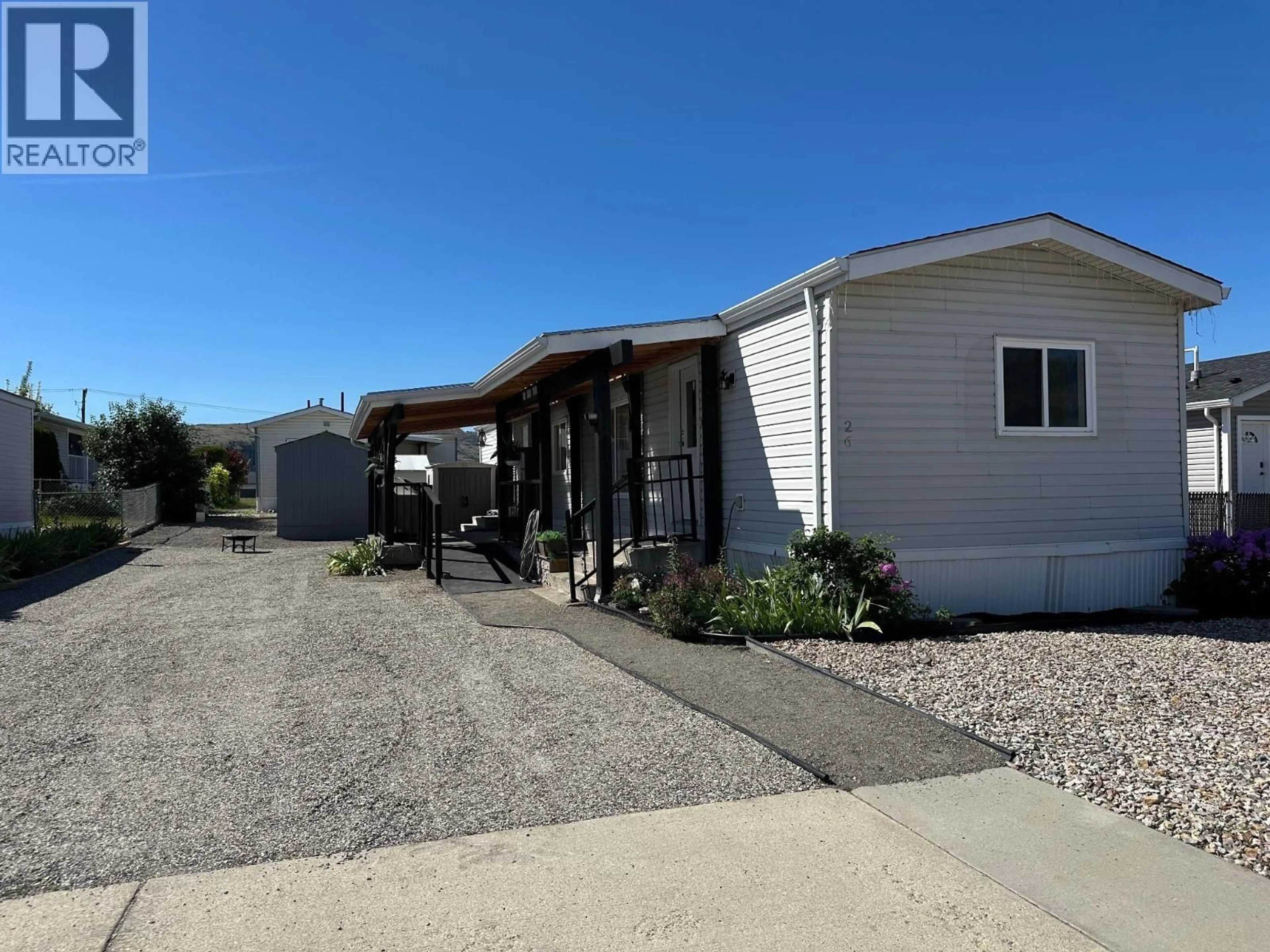 Home with vinyl exterior material, street for 26 - 12560 WESTSIDE ROAD, Vernon British Columbia V1H1S9