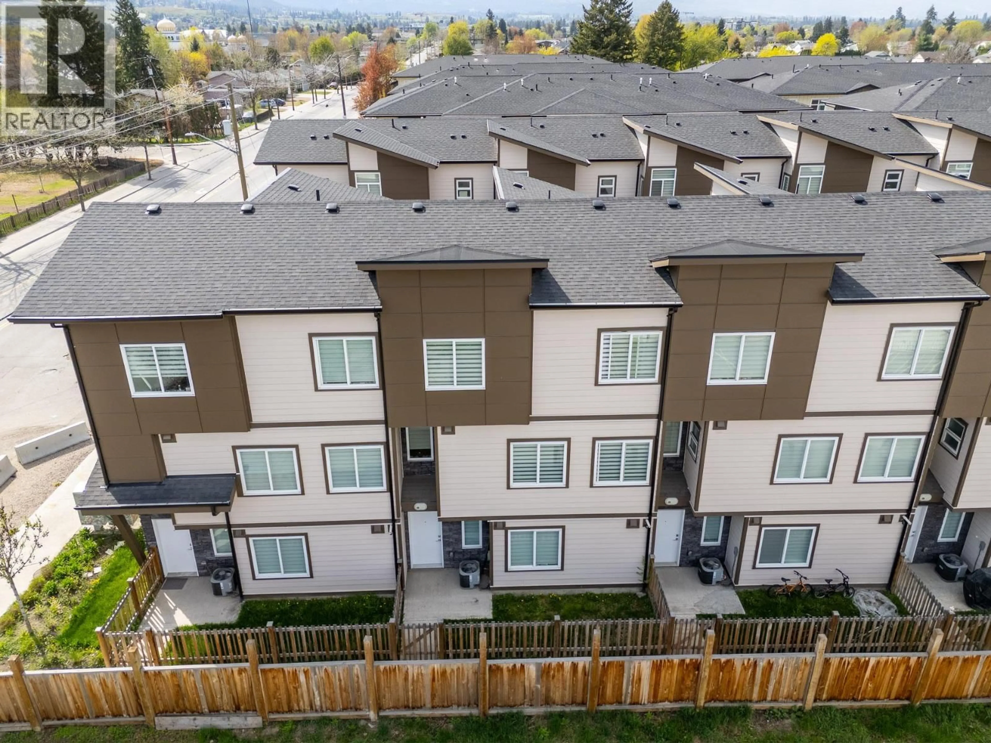 A pic from outside/outdoor area/front of a property/back of a property/a pic from drone, mountain view for 2 - 1354 RUTLAND ROAD NORTH, Kelowna British Columbia V1X4Z3