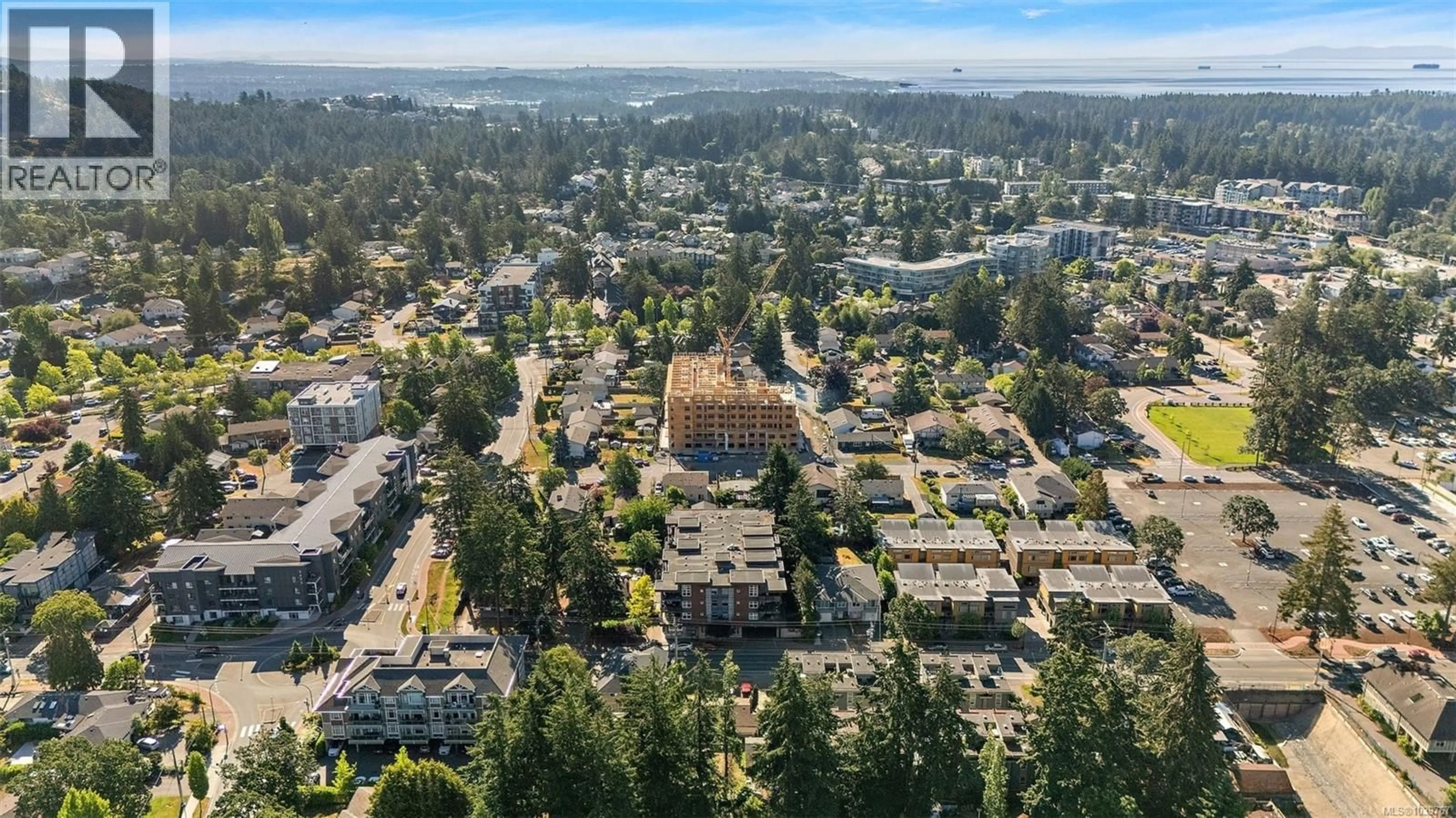 A pic from outside/outdoor area/front of a property/back of a property/a pic from drone, city buildings view from balcony for 304 - 2717 PEATT ROAD, Langford British Columbia V9B3V2