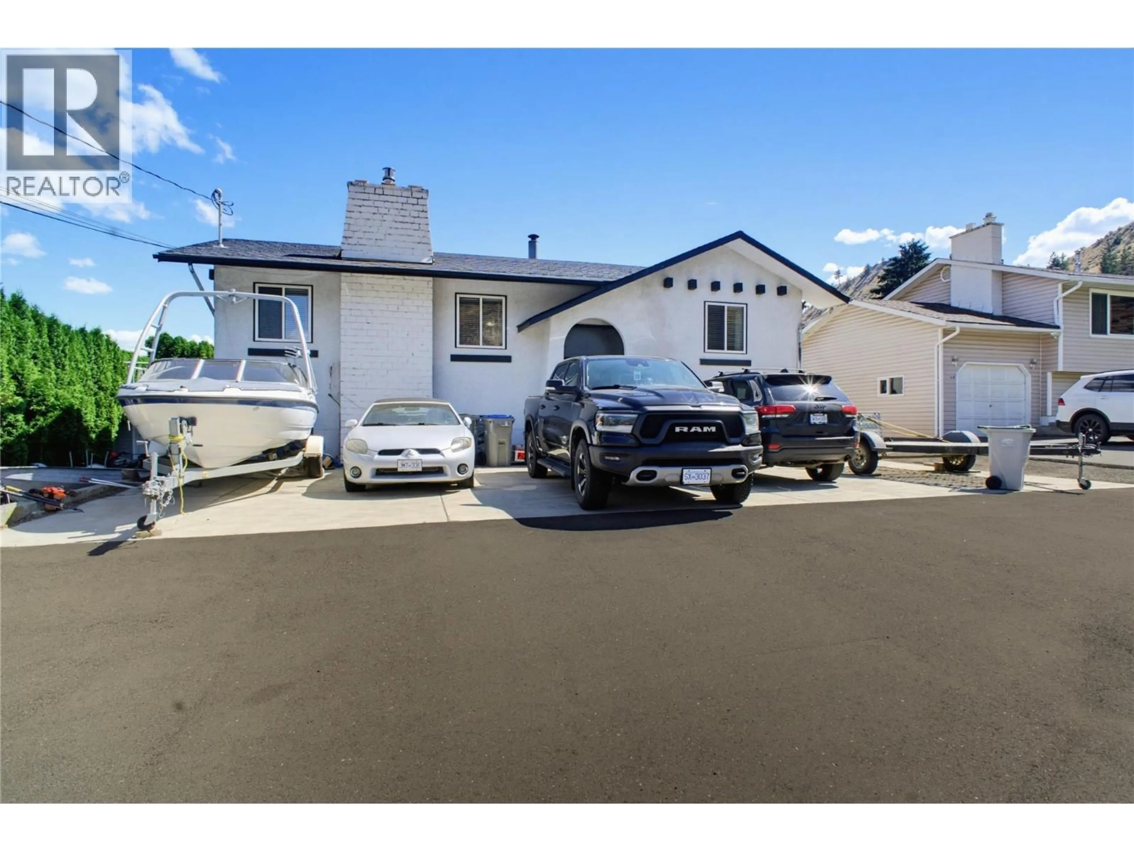 A pic from outside/outdoor area/front of a property/back of a property/a pic from drone, street for 15 KELSO CRESCENT, Kamloops British Columbia V2C5A1