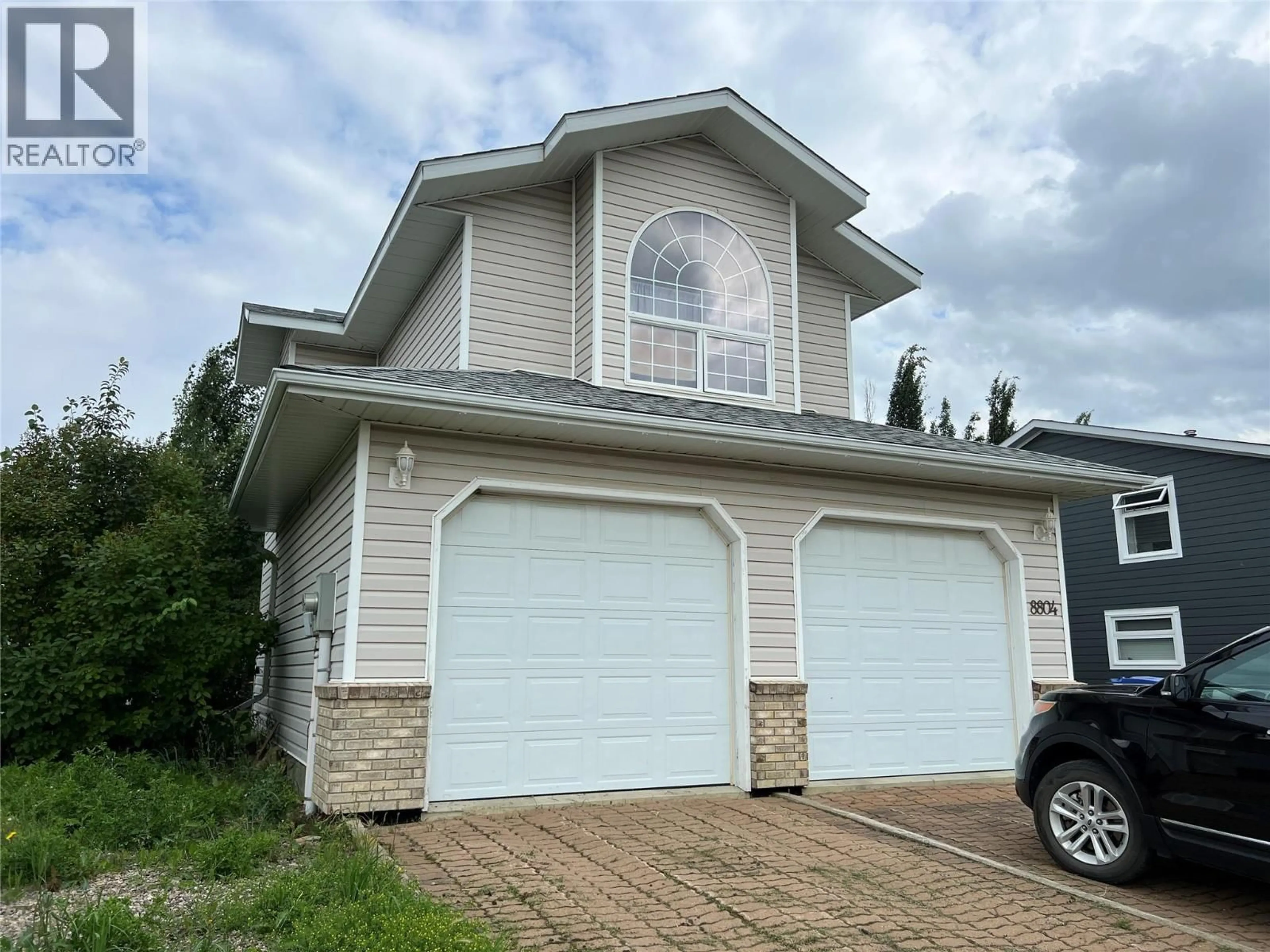 Home with vinyl exterior material, street for 8804 20 STREET, Dawson Creek British Columbia V1G4S3
