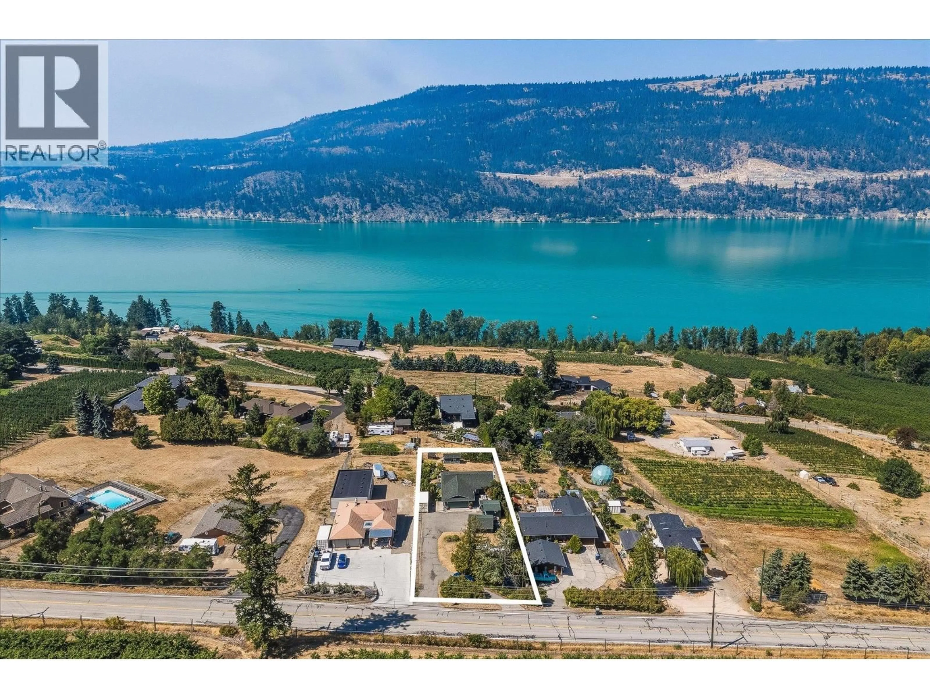 A pic from outside/outdoor area/front of a property/back of a property/a pic from drone, water/lake/river/ocean view for 13890 OYAMA ROAD, Lake Country British Columbia V4V2B2