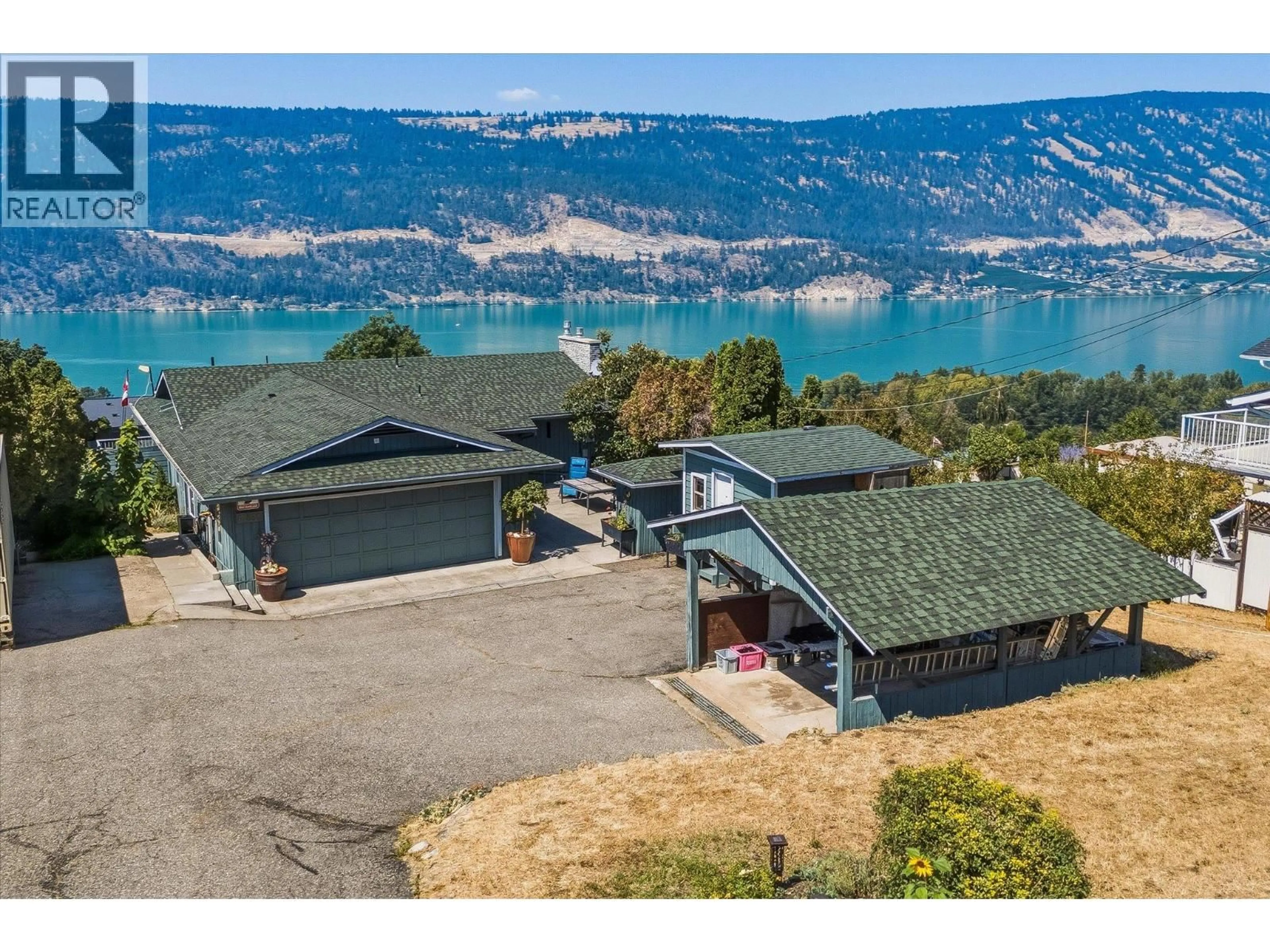 A pic from outside/outdoor area/front of a property/back of a property/a pic from drone, water/lake/river/ocean view for 13890 OYAMA ROAD, Lake Country British Columbia V4V2B2