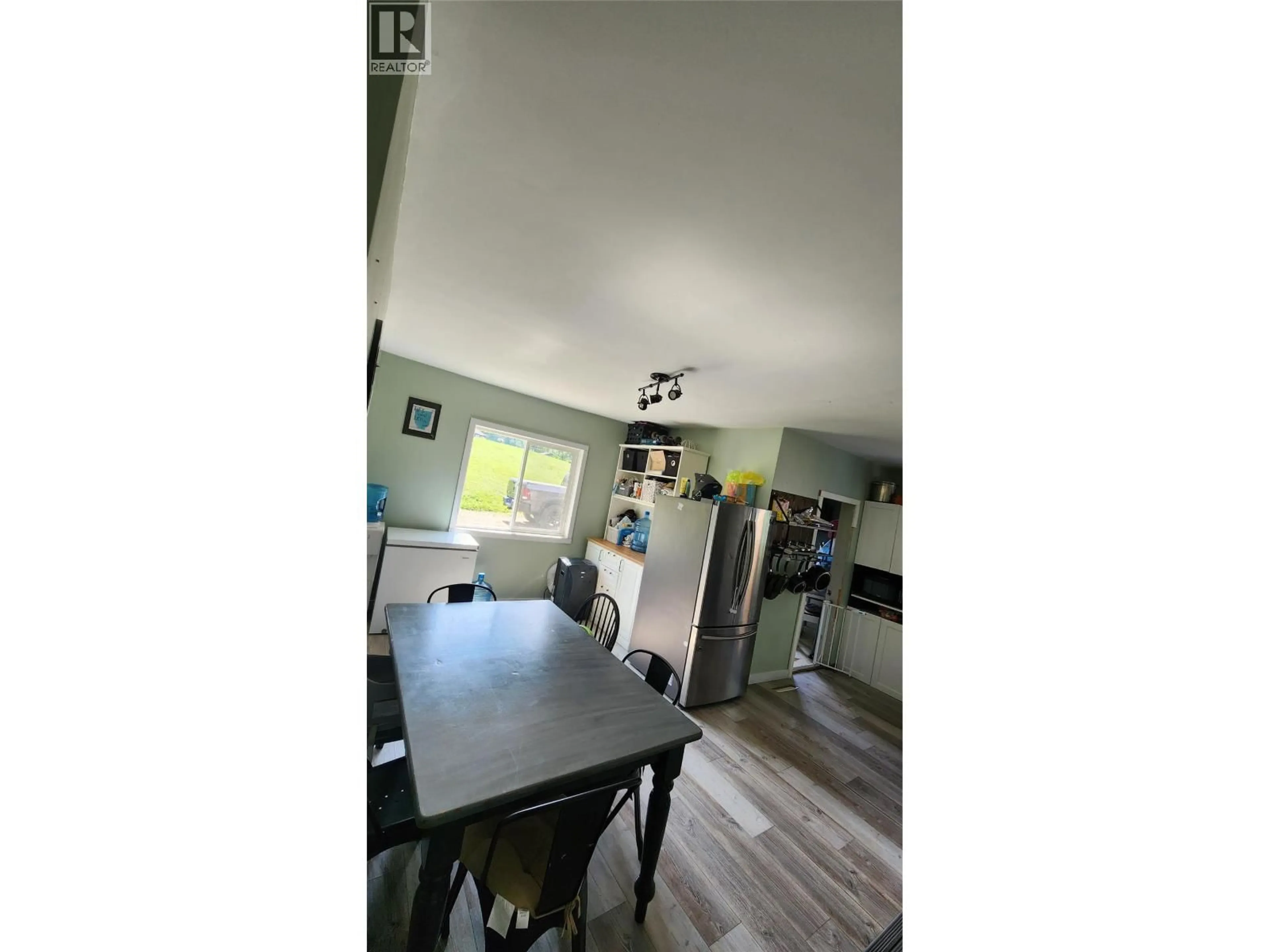 Dining room, wood/laminate floor for 13287 LINKLATER LANE, Pouce Coupe British Columbia V0C2C0
