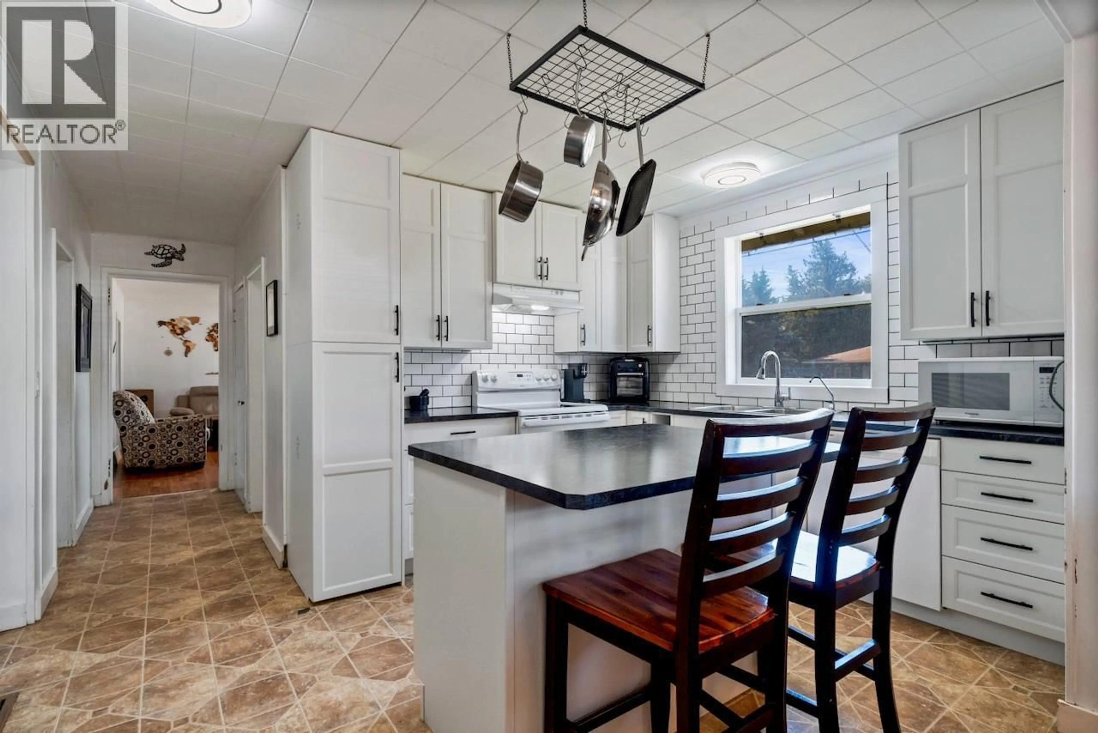 Open concept kitchen, ceramic/tile floor for 5722 97 HIGHWAY NORTH, Falkland British Columbia V0E1W0