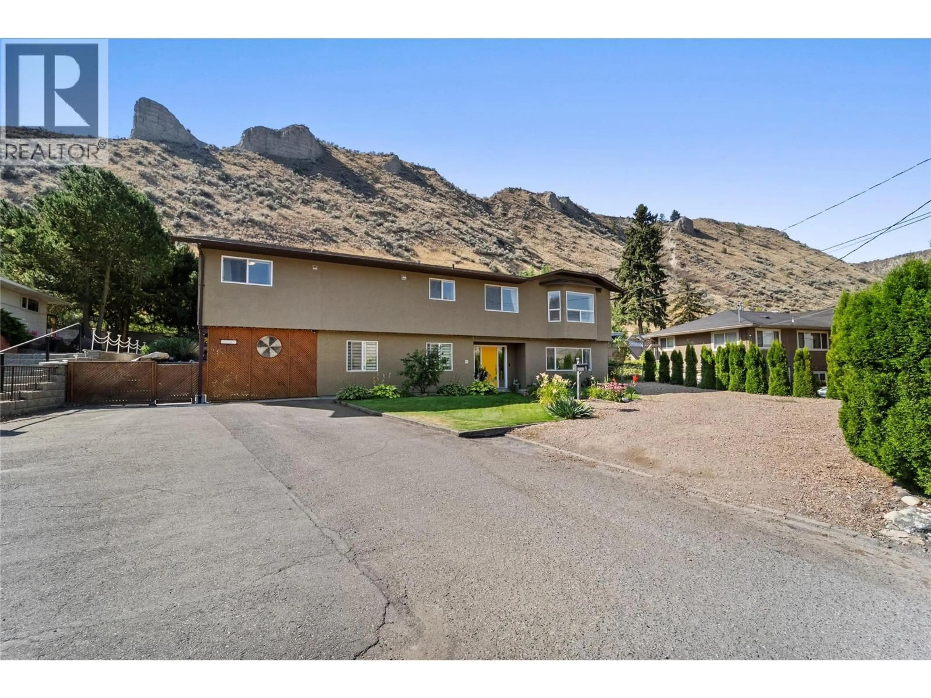 A pic from outside/outdoor area/front of a property/back of a property/a pic from drone, mountain view for 2045 VALLEYVIEW DRIVE, Kamloops British Columbia V2C4C3