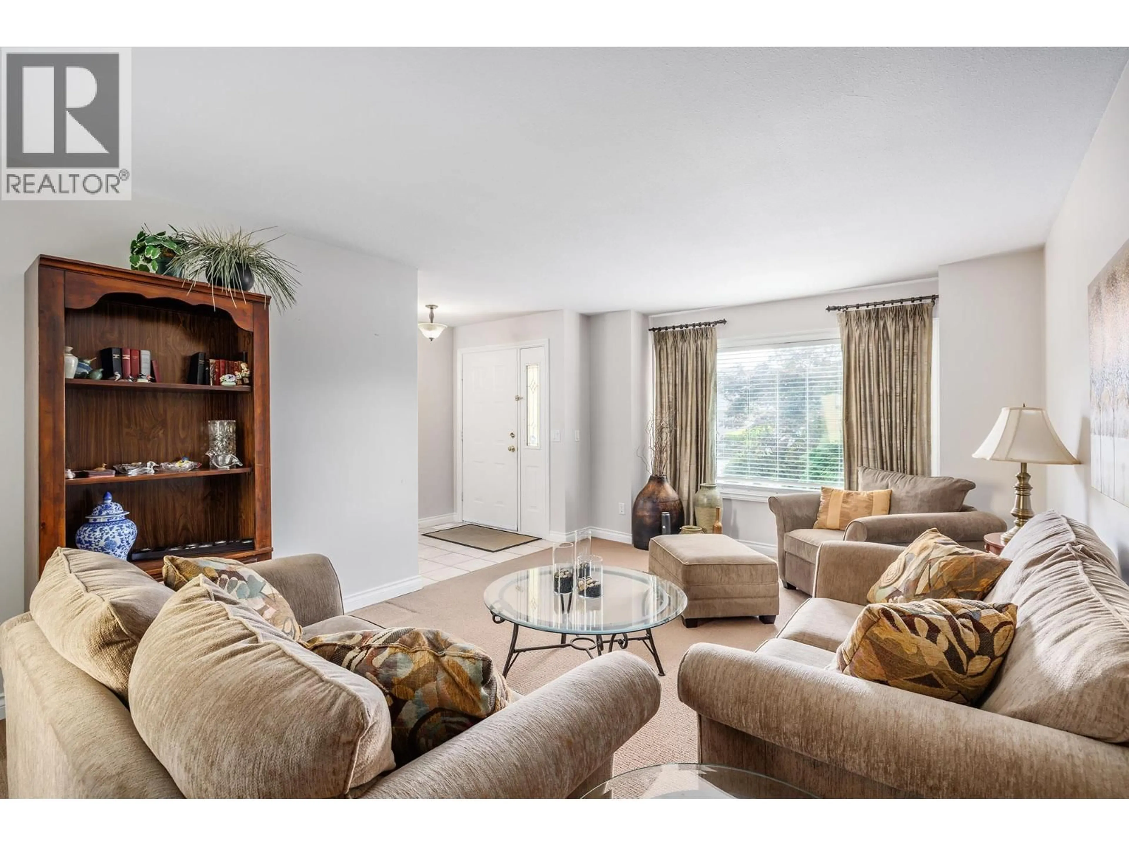 Living room with furniture, unknown for 897 MISSION SPRINGS CRESCENT, Kelowna British Columbia V1W3L9