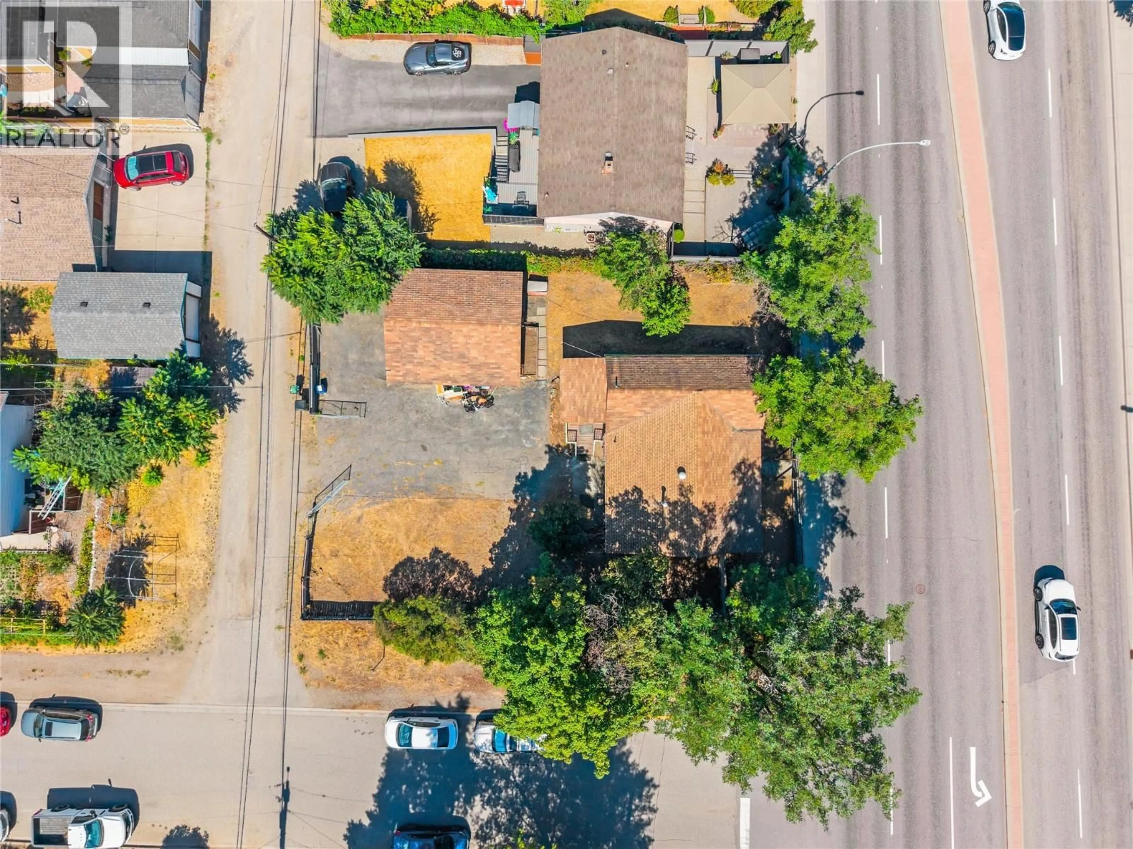 A pic from outside/outdoor area/front of a property/back of a property/a pic from drone, street for 2100 32ND STREET, Vernon British Columbia V1T5L1