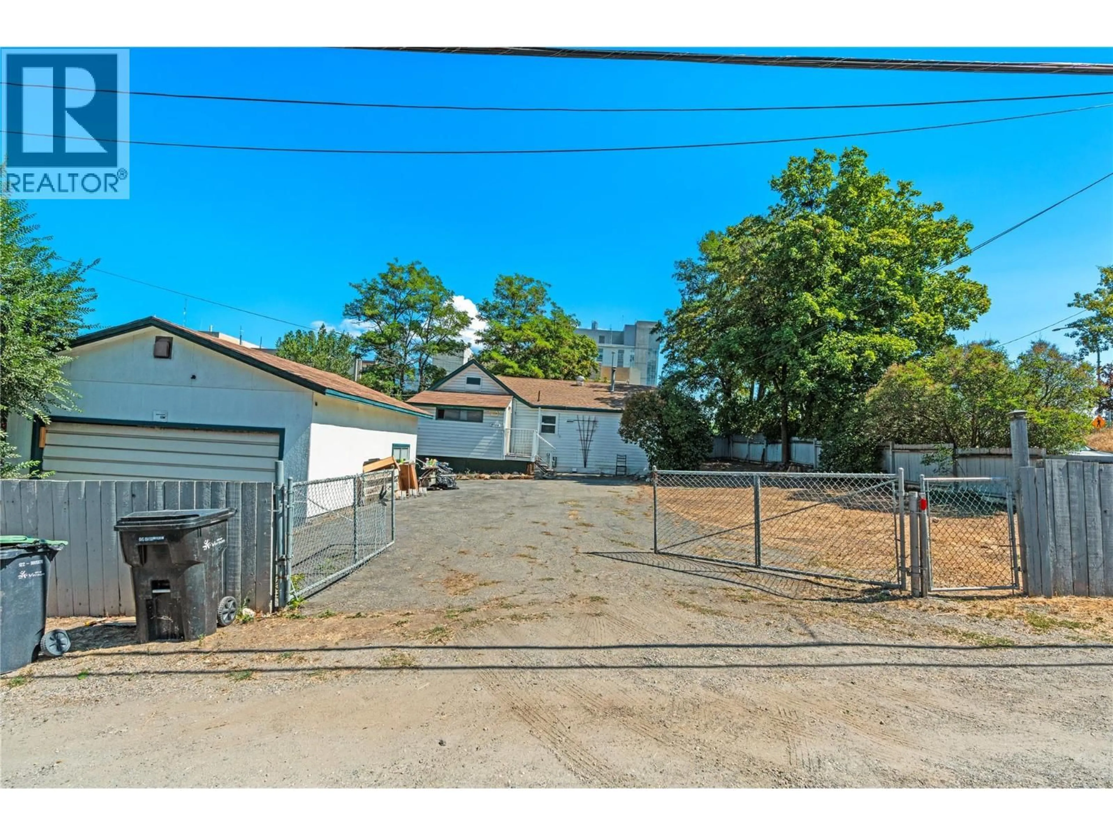 A pic from outside/outdoor area/front of a property/back of a property/a pic from drone, street for 2100 32ND STREET, Vernon British Columbia V1T5L1