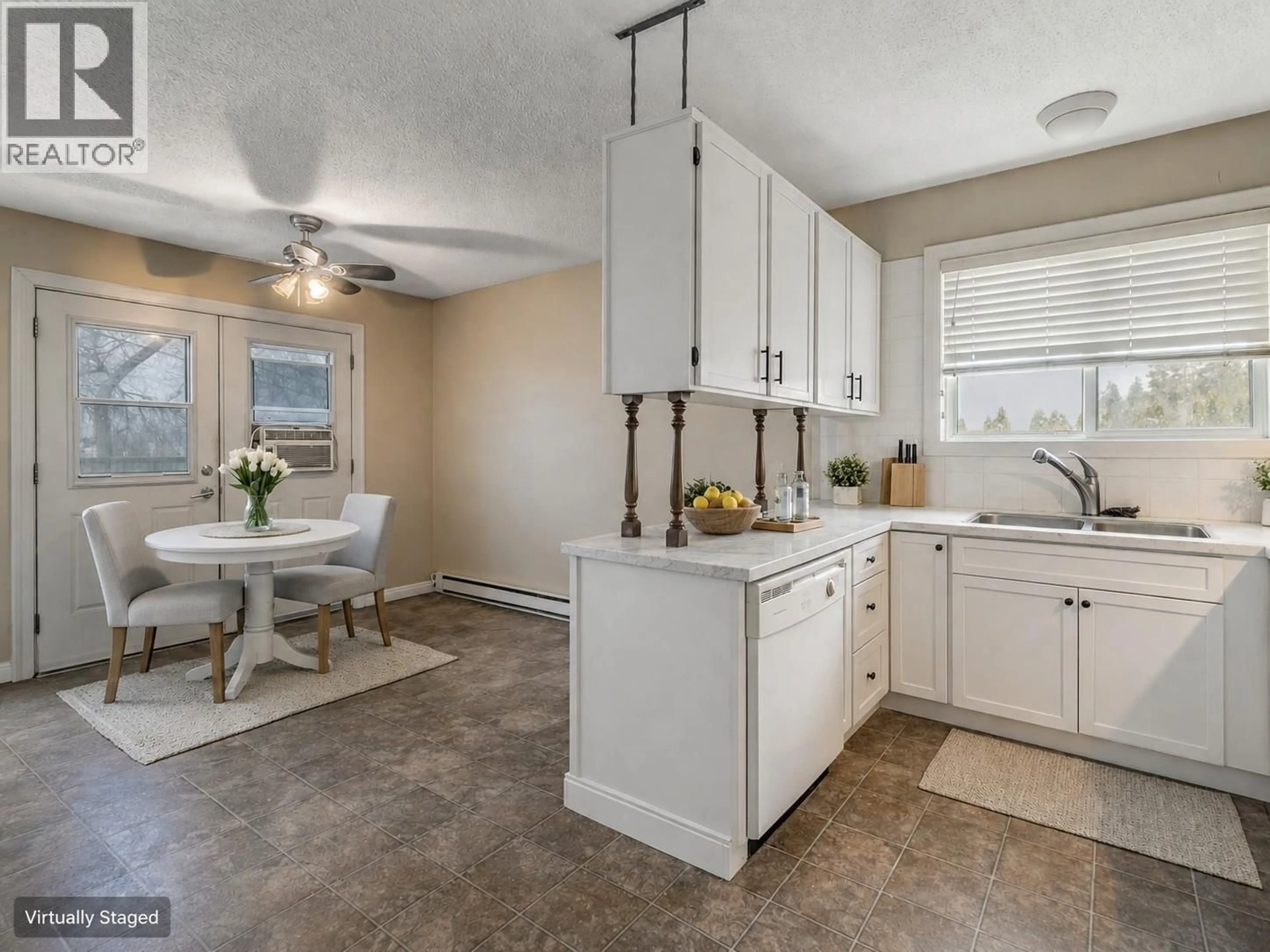 Open concept kitchen, ceramic/tile floor for 1105 CACTUS ROAD, Kelowna British Columbia V1X5N3